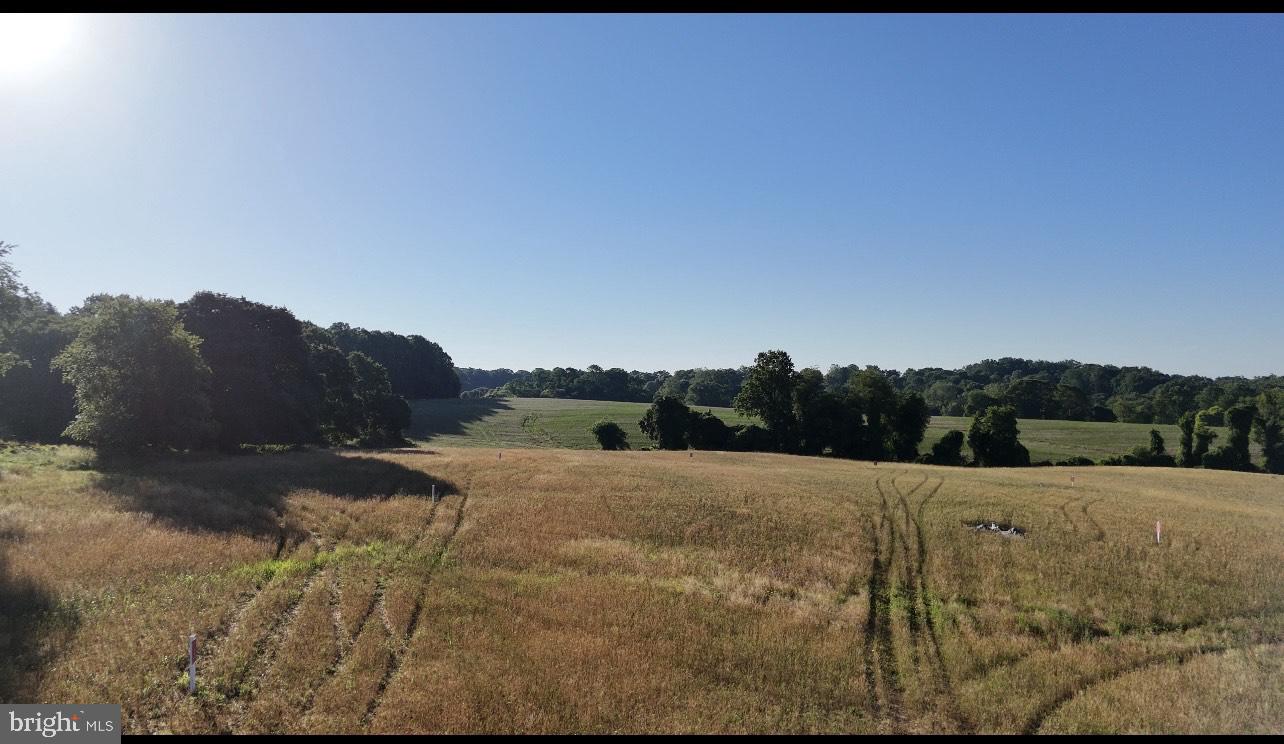 Opportunity to  build your dream home on 1.946 acres of land in beautiful Fallston. Make your dream home a  reality by designing it with Battaglia Homes,  The home is to be at least 4,000 sq ft,  to 5,000 sq ft finished basement, with options for main level primary or guest suite, fireplace, cathedral ceilings, floorplans to meet your lifestyle and needs. No HOA,  Builder tie in with Battaglia Homes . Lot is vacant and list price is for the land only.) Photos are of a model for marketing purposes.