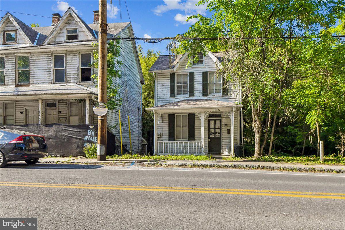 Prime Renovation Opportunity: Welcome to this 1920s Colonial gem located on prestigious Main Street in Upper Ellicott City. This 2-bed, 1-bath detached home offers tremendous potential for savvy investors and renovation enthusiasts. Situated on a generous 3,935 sq ft lot, this property presents an exceptional opportunity to restore a classic piece of Ellicott City's architectural heritage. This charming colonial-style home features the classic character and craftsmanship of early 20th-century construction. A walkout basement with rear access offers great potential for creative use and additional living space. Situated on Main Street in upper Ellicott City, this home sits in one of the region's most desirable and walkable neighborhoods. The area is known for its charming historic architecture, local shops, restaurants, and galleries. It offers excellent walkability and strong community character. This property is ideal for investors and renovation professionals looking for significant upside potential. Original 1920s colonial architecture, a prime Main Street location in Ellicott City that offers great rental potential, as well as appreciation potential supported by strong community investment in this Historic neighborhood. The solid roof (roof approx. 10 yrs), generous lot, and a prime Main Street location provide an excellent foundation for a successful renovation project. Don't miss this chance to own a piece of Ellicott City history!  - As-is sale. Buyer to perform own inspections and due diligence.
