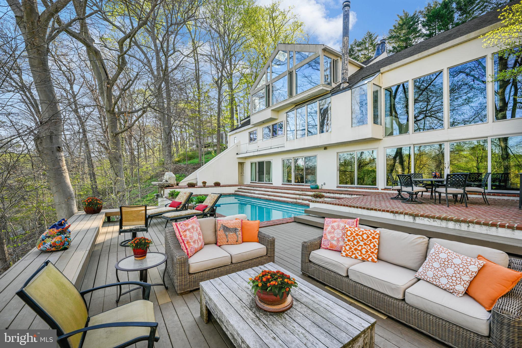 BEST OFFERS IN BY SUNDAY APRIL 28TH MIDNIGHT. SELLERS PREFER NO ESCALATION CLAUSES.

Live authentically. Jimmy Grieves designed iconic contemporary vessel that served as his personal home. Overlooking glistening Lake Roland in all its glory offering sanctuary like privacy.  Prime access to the park and unrivaled water views. Commune with nature as storms roll in and sunsets melt away the day... epic bird watching... live amongst the trees from your glassy perch. Awe-inspiring 2 story great room with patinaed brick floor and expansive wall of glass punctuate the natural splendor. An elevated pool offers the ultimate dip while cocooned in lushly greened privacy. A jaw-dropping owners suite that evokes boutique casita flow...everything you covet on hoilday... brought home.  Open dramatic shower... soaking tub with a view. Reconnect with the joy of getting dressed every day... experience the dressing room of your dreams. Vaulted ceiling... incredible lights... a destination third floor office/exercise space... a home think tank with so many possibilities.  A carefully orchestrated environment can change so much about your living experience and daily rhythms. A rare opportunity to be in the county with awe-inspiring architecture... make it your own. Stamp your aesthetic on this modern masterpiece. Relish the lymph pumping invigorating walks around Lake Roland. Gated drive. Just minutes to Corner Pantry and Whole Foods. Cultivate your existence. The art of uniting human and home.
WHEN YOU VIST FOR SHOWINGS, PLEASE PARK OUTSIDE OF THE GATE AND WALK UP TO THE HOUSE. THANK YOU.