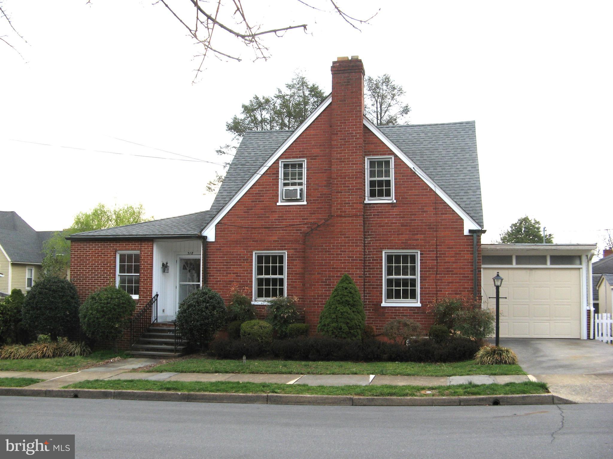 Charming older brick home close to Handley High School.  3 bedroom, 2 full bath,  and large rear yard.   Formal living room, dining room, family room, master bedroom on first floor.  Basement has two rooms, washer and dryer, unheated utility room.  2 bedrooms on 2nd floor with full bathroom cooled by window units.  Garage for small car or storage.  Fireplace can not be used.   Tenant pays all utilities to include electric, water/sewer and oil.  No pets or smoking/vaping, please!  Owner requires one year on the job with proof of employment and a credit score of 675 or better.