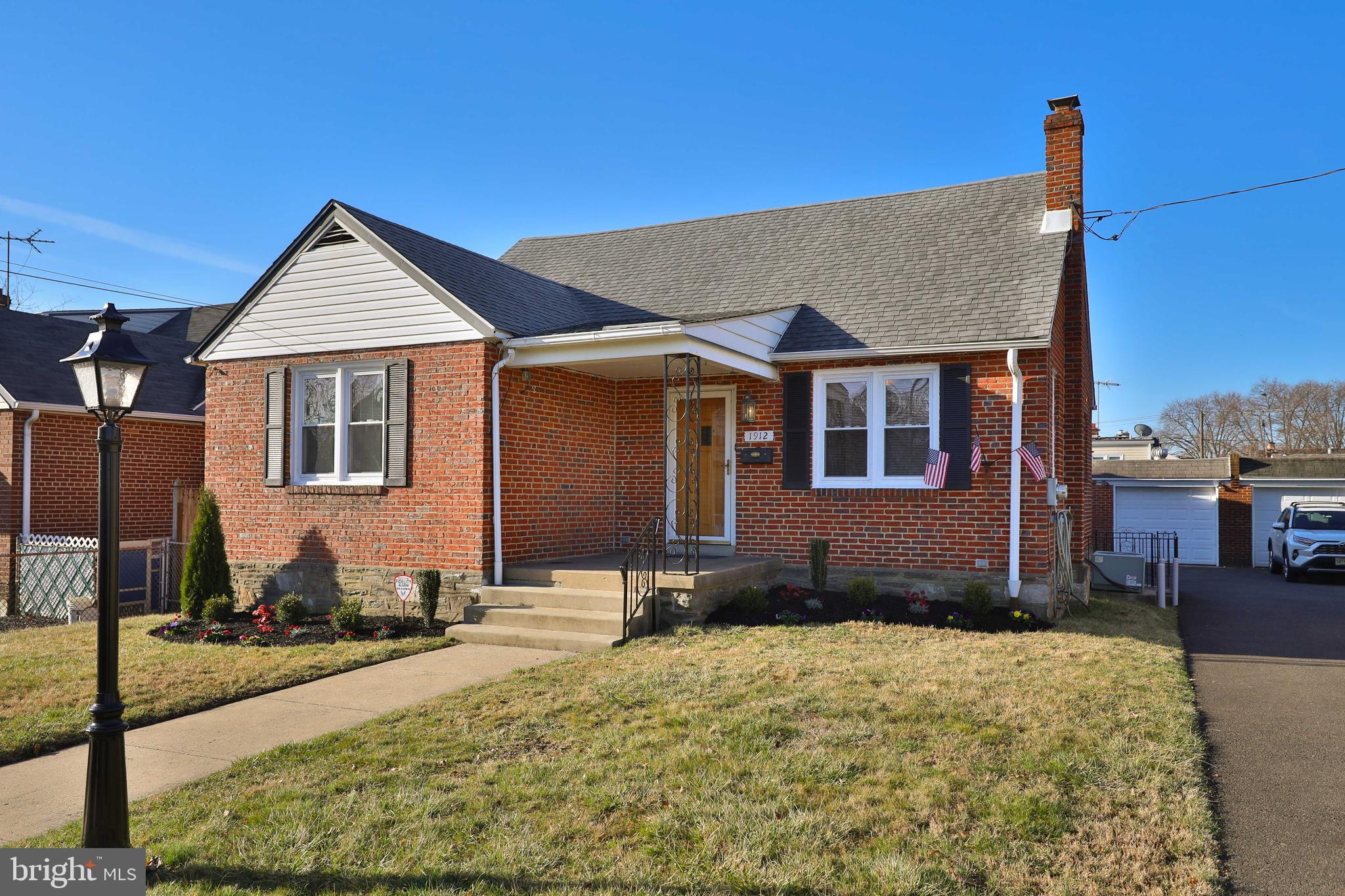 Charming brick Cape Cod in the Rhawnhurst section of Philadelphia. This well-maintained home offers a spacious and versatile layout with modern updates and fantastic living spaces.  
The first floor features a bright living room and a beautifully updated kitchen with abundant cabinetry, generous counter space, a large window over the sink, recessed lighting, a gas range, built-in microwave, and dishwasher. An adjacent eating area flows seamlessly into a huge family room addition with skylights, recessed lighting, a high ceiling, two ceiling fans, a closet, and its own heating and air conditioning system, making it ideal for entertaining or relaxing. Two comfortable bedrooms with ceiling fans and a hall bathroom with a walk-in shower complete the main level.  
Upstairs, there are two additional bedrooms with ceiling fans and a second hall bathroom with a tub. The basement offers a laundry area with a utility sink, plenty of storage, and a convenient walk-out to the backyard.  
Outdoor features include a small side patio and a nice level yard. The detached one-car garage is equipped with electricity, perfect for storage or a workshop. Additional highlights include replacement windows throughout.  
A fantastic opportunity to own a spacious home in a great location. Schedule your showing today!