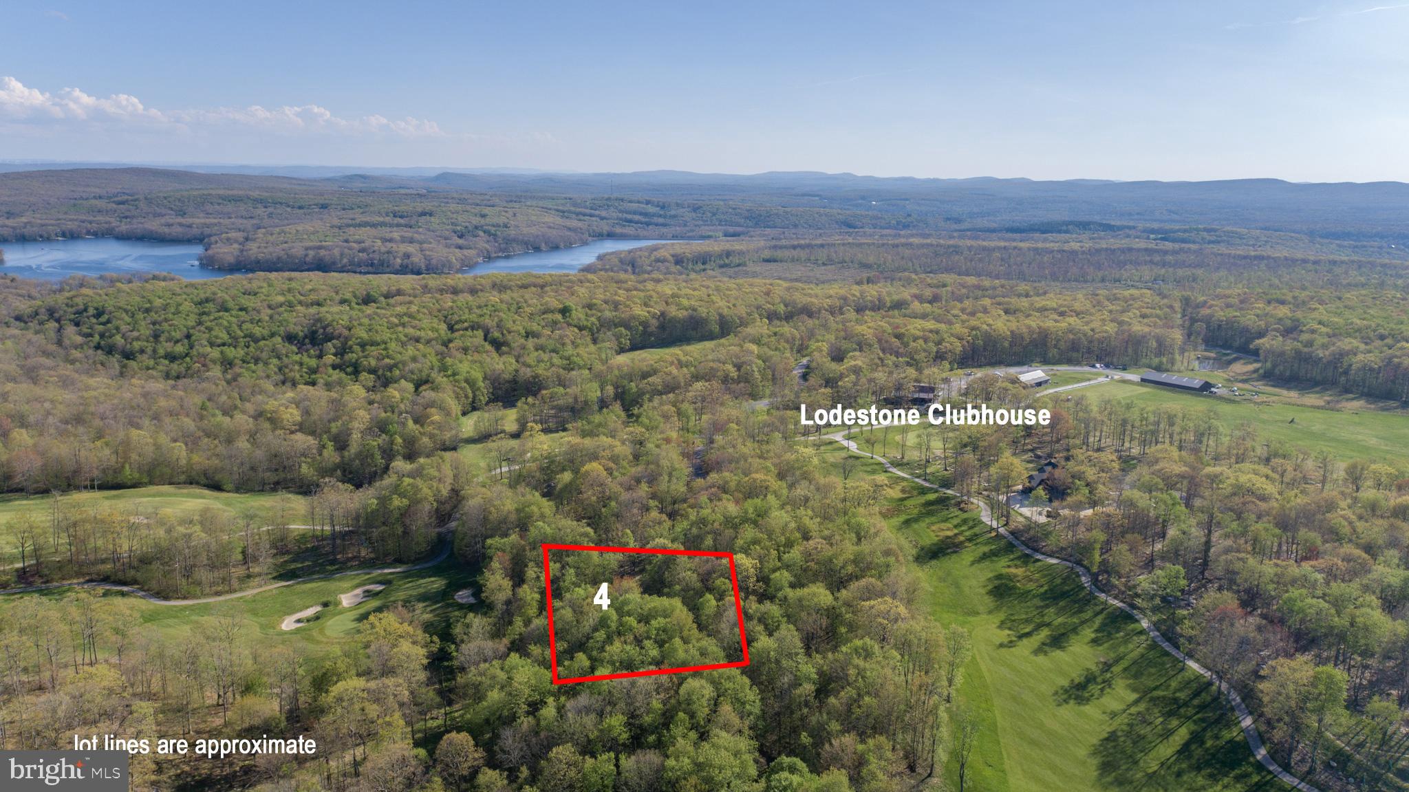 Build your Deep Creek Lake retreat on this .32-acre homesite in the Lodestone community! Adjoining hole #9  one of one the areas premier golf courses, this level to gently sloping lot offers public water, sewer, and utility hookups. Enjoy a peaceful golf course setting while remaining just minutes from Deep Creek Lake, Wisp Resort, restaurants, shopping, marinas, and year-round recreation. A great opportunity to build your primary residence, vacation home, or investment property in the heart of Deep Creek Lake. Call today!