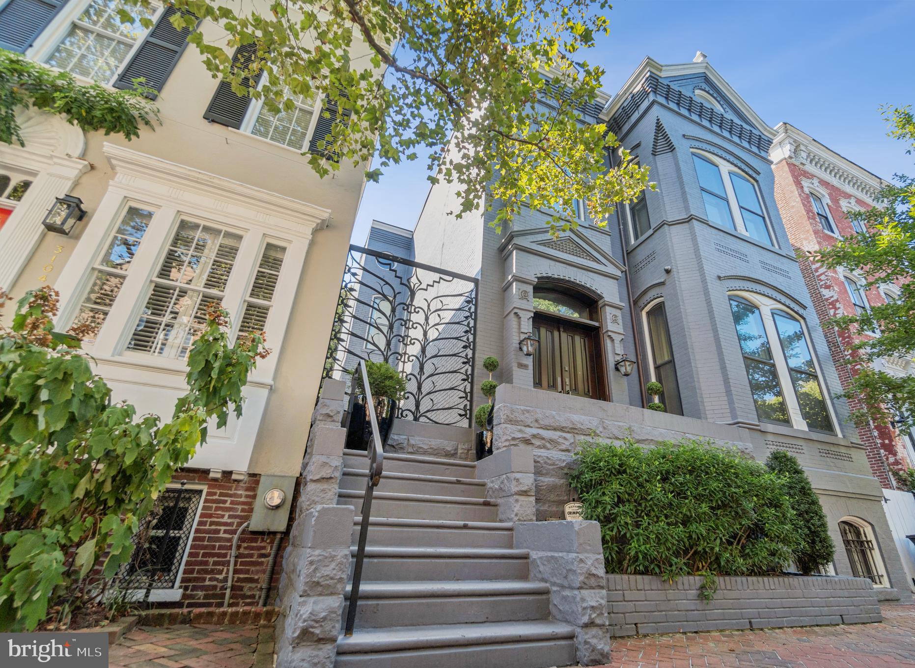 A rare Georgetown offering, this classic detached East Village Federal has been meticulously maintained and thoughtfully updated while preserving its timeless architectural detail. Featuring an expansive layout with soaring ceilings, hardwood floors, and a sunlit gourmet kitchen. The walkout level leads you to an immaculately landscaped tiered terrace. Complete with a detached guest house and 3-car garage parking—a true Georgetown rarity. (Upper Level 2 - Room Count Includes Guest House)