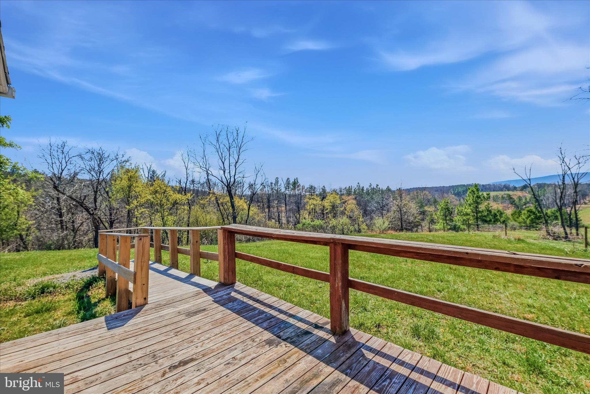 Mountain views for days! This 3-bedroom, 2-bath home sits on 2 scenic acres in Berkeley Springs and offers the peaceful country lifestyle buyers love. Enjoy breathtaking sunsets, open skies, and privacy while still being just minutes from the historic town of Berkeley Springs. The property provides the perfect setting for a full-time residence, weekend getaway, or mountain retreat. Being Sold AS-IS.