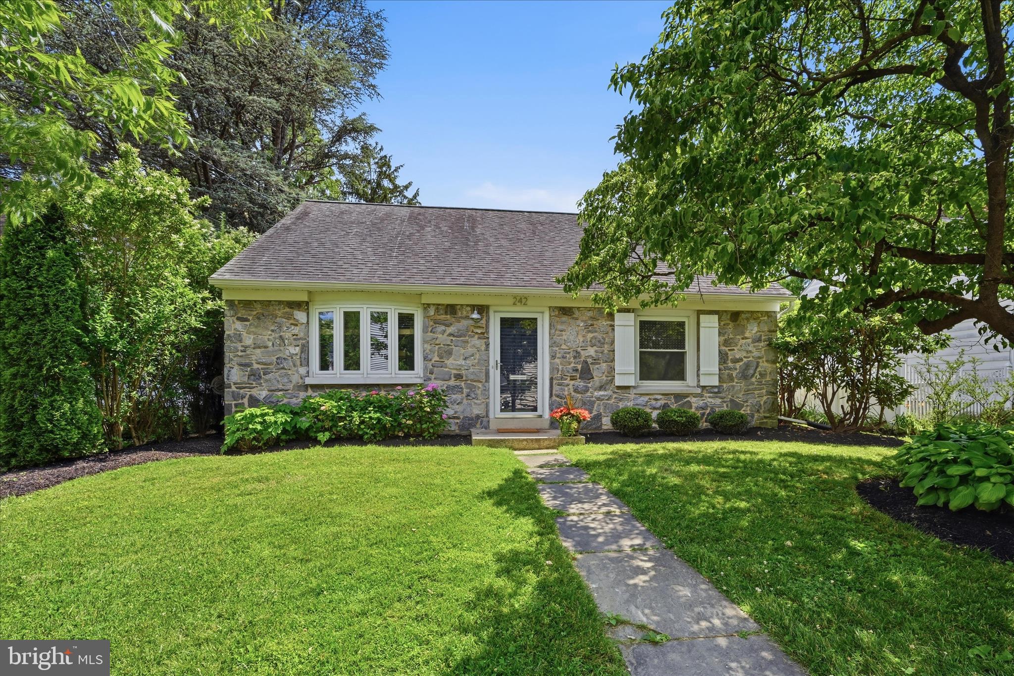 This charming Cape Cod nestled in Clearview neighborhood offers a perfect blend of comfort and style. With four spacious bedrooms and two full baths, the interior features hardwood floors, recessed lighting, and a cozy breakfast area that invites gatherings. The formal dining room is ideal for entertaining, while the partially finished basement provides additional space for hobbies or relaxation. Step outside to enjoy the beautifully landscaped yard, which backs to serene trees, creating a peaceful retreat. The enclosed patio and screened porch are perfect for enjoying warm evenings. Located just under a mile from bus and commuter rail stations, this home offers convenient access to transportation. The neighborhood boasts excellent schools, parks, and community amenities, making it a wonderful place to call home. With a lot size of 0.15 acres, there's plenty of room for outdoor activities. Experience the warmth and charm of this delightful property in a vibrant community!