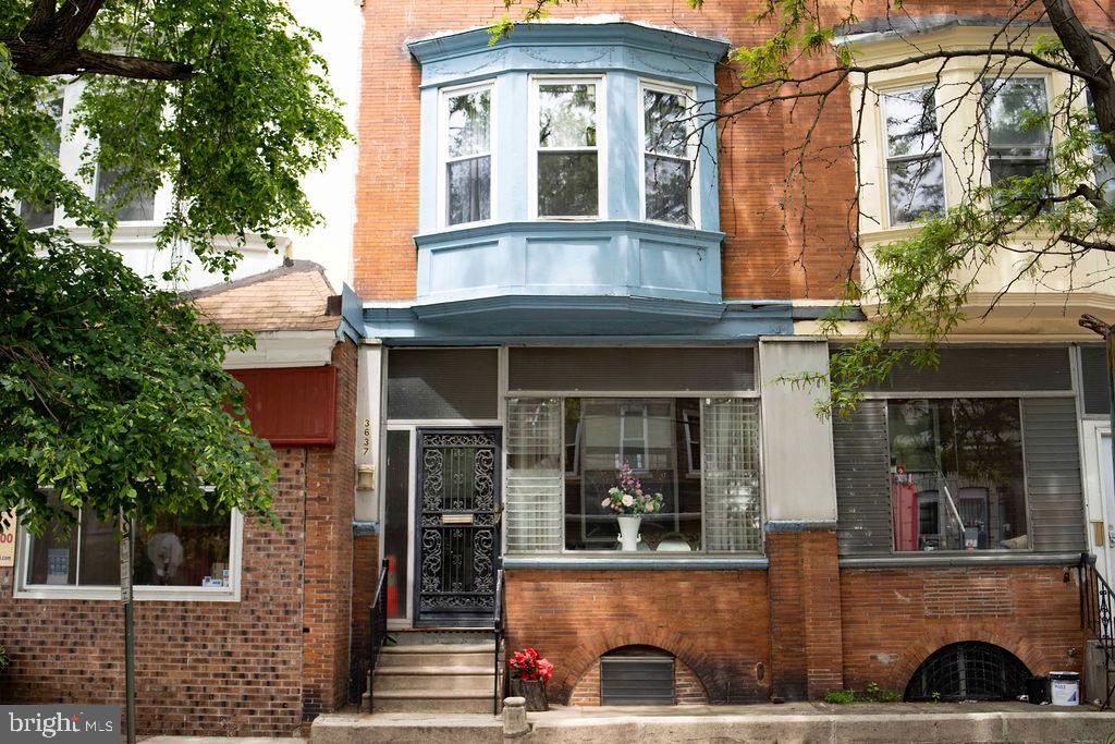 Investor’s dream in the heart of Powelton Village! This spacious 7-bedroom, 4-bath home at 3637 Spring Garden Street, Philadelphia offers incredible potential in a highly desirable location. Step inside to a welcoming living room upon entry, leading into a classic layout ready for your vision. The property features three stories of living space, a full basement, and an enclosed porch, providing ample square footage and flexibility for renovation or redevelopment. Perfect for investors or savvy buyers, this home is ideal for a rental portfolio, multi-tenant use, or a full restoration project. Conveniently located near universities, public transportation, dining, and the Art Museum.  Don’t miss this opportunity to own a large property with endless possibilities in one of West Philadelphia’s most sought-after neighborhoods.