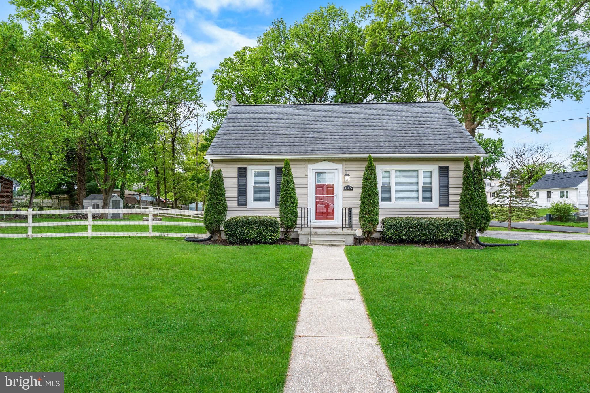 This charming 3-bedroom, 2-bath home sits on a spacious corner lot, offering plenty of outdoor space for entertaining, including a fenced backyard, a fire pit, and a private enclosed patio. Inside, you'll find a kitchen equipped with stainless steel appliances,  a large finished basement perfect for recreation, and a generously sized laundry and storage room. Nestled in a tranquil neighborhood, this home provides a peaceful setting while remaining conveniently close to local amenities and shopping.