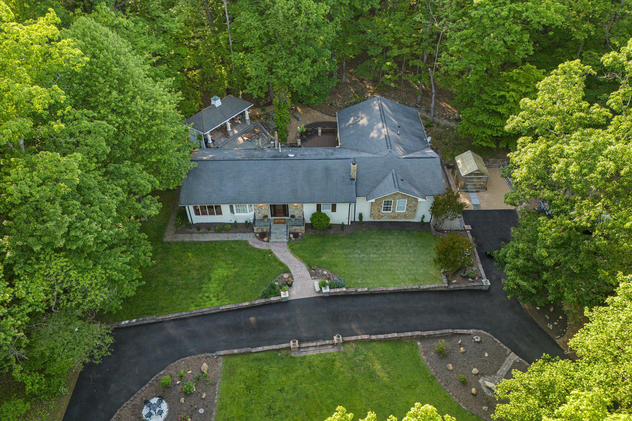 Welcome to 3800 Mountain Road; A rare Haymarket retreat on 1.47 acres, offering approximately 4,558 total finished square feet, with 2,565 square feet on the main level and 1,993 square feet on the lower level per floor plan. Proudly cared for by the same owner for nearly 30 years, this special property offers privacy, space, character, and a peaceful nature and wildlife setting that is hard to duplicate.
The main level features 3 bedrooms and 3 full bathrooms, including a spacious primary suite, generous living areas, kitchen, dining area, family room, breakfast nook, and main-level laundry. The beautiful stone featured on the home was hand selected by the current homeowner from the land itself, creating a meaningful connection between the home and its natural surroundings.

The lower level expands the possibilities with 1 additional bedroom, 2 full bathrooms, area for a 2nd kitchen, dining area, bath and laundry space, bar area, recreation room, utility areas, and a large additional living area. A charming vintage wood stove/fireplace feature with chimney pipe adds warmth, character, and a cozy focal point to the lower-level gathering space. The layout can easily accommodate multi-generational living, extended guests, recreation, work-from-home needs, or a flexible separate living arrangement. Wooded privacy, open outdoor space, NO HOA, private well and septic, and a U-shaped driveway with two exits for added convenience. The property offers the freedom, function, and privacy many buyers are searching for in Haymarket. 

The surrounding area offers even more lifestyle value with nearby parks, lakes, trails, children’s camps, golf, wineries, breweries, shopping, dining, historic Haymarket charm, Gainesville conveniences, and access to major commuter routes. A property with this much space, flexibility, acreage, and character is a rare opportunity. Seller is offering a one-year buyer home warranty by CINCH at settlement, subject to mutually acceptable contract terms. Make your move today! Call to book your private tour.