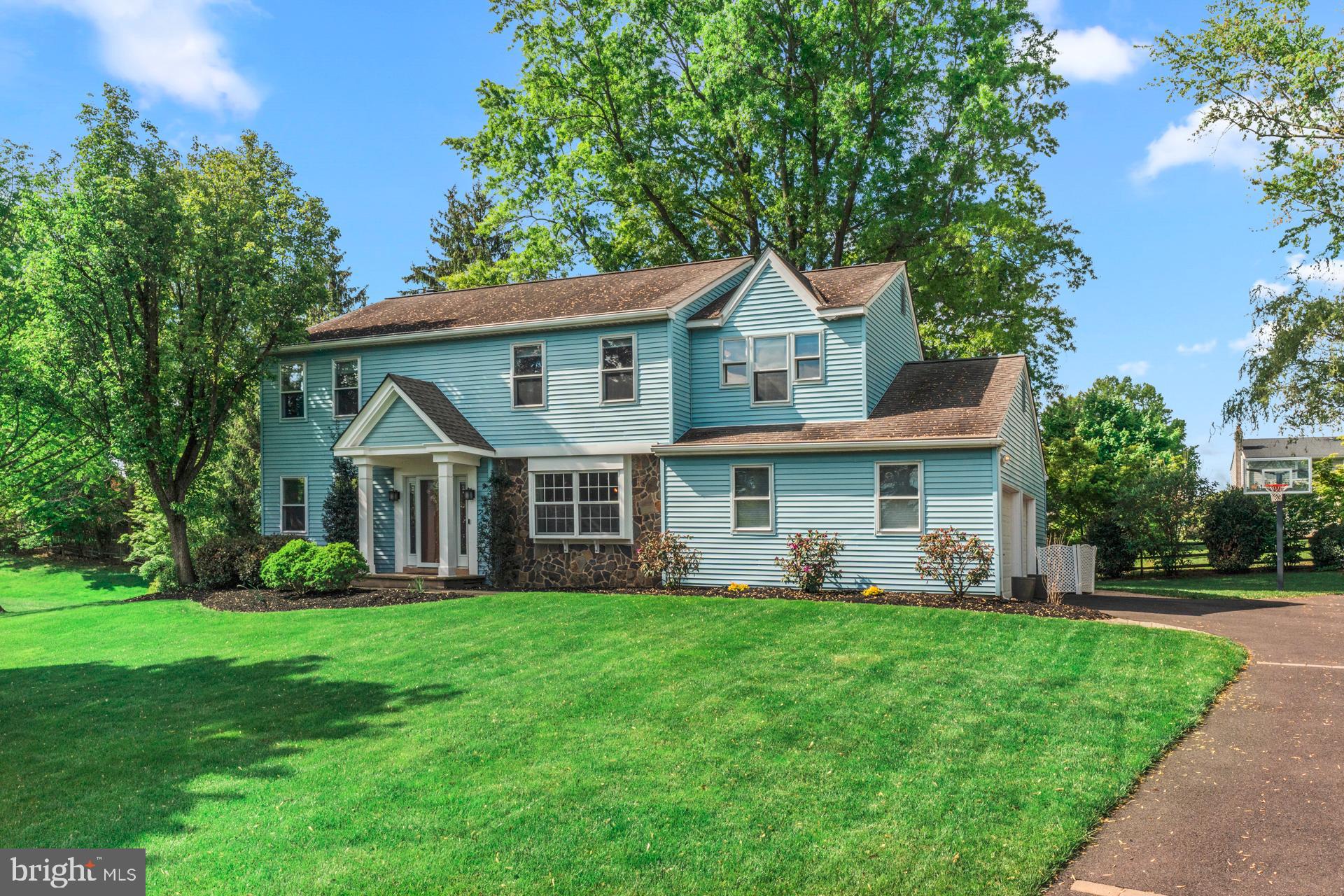 Nestled on a quiet cul de sac in the highly desirable Council Rock School District, this beautifully maintained home offers a perfect blend of comfort, style, and everyday convenience. Lush landscaping creates a warm welcome, while a charming brick pathway leads you to the front entrance.

Step into the inviting foyer, flanked by a formal living room and dining room, and immediately notice the hardwood flooring that flows throughout most of the first floor. The living room provides an ideal space for relaxing or entertaining, while the dining room features a large bay window and an easy connection to the kitchen, making it perfect for gatherings both large and small.

The heart of the home is the spacious family room, highlighted by a custom built fireplace and filled with natural light. Double glass doors provide seamless access to the backyard, creating an effortless indoor outdoor flow. The family room opens to the kitchen, complete with granite countertops, quality appliances, and thoughtfully designed cabinetry. Just beyond, the breakfast room offers a bright and airy space for casual dining, featuring vaulted ceilings, a skylight, and unique built ins.

Additional first floor conveniences include a powder room and a laundry room with direct access to the two car garage, as well as an exterior door to the backyard.

Upstairs, the primary suite serves as a true retreat with two walk in closets, an additional closet for extra storage, and a beautifully renovated oversized ensuite bathroom designed with spa like finishes. Three additional well sized bedrooms share a fully remodeled hall bathroom featuring a double sink vanity, tile flooring, and a tub shower with tiled walls.

The lower level offers a finished space perfect for a game room, play area, or additional living space, along with a separate unfinished area providing abundant storage and a Bilco door for convenient backyard access.

Step outside to enjoy a private backyard oasis featuring a spacious patio area that is perfect for entertaining during the warmer months, surrounded by mature trees that provide both shade and privacy. A storage shed adds even more functionality for outdoor equipment.