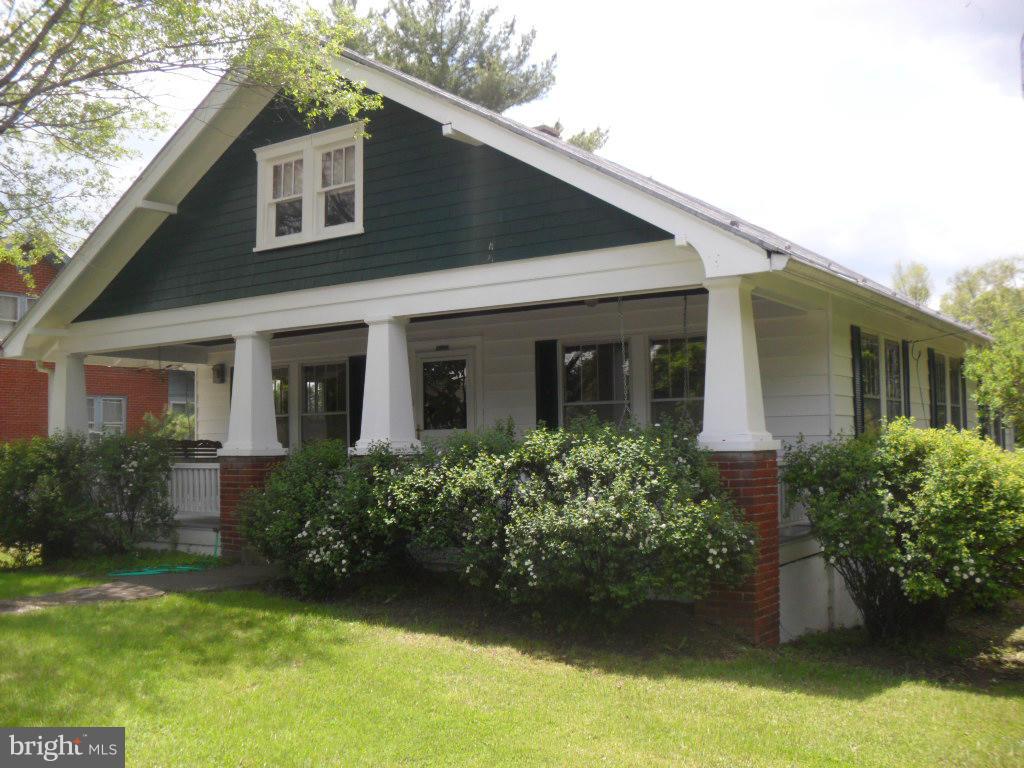 Charming Vintage Bungalow in the heart of historic Gerrardstown.This home features wood floors throughout. Home has been freshly painted inside and out. Large Front Porch which features two swings. Enclosed back sun porch, New tile in Bath, Full basement,Two car detached garage,Shed, Large back yard that backs to a wet weather stream.If you love the charm of a vintage home then this is the one!