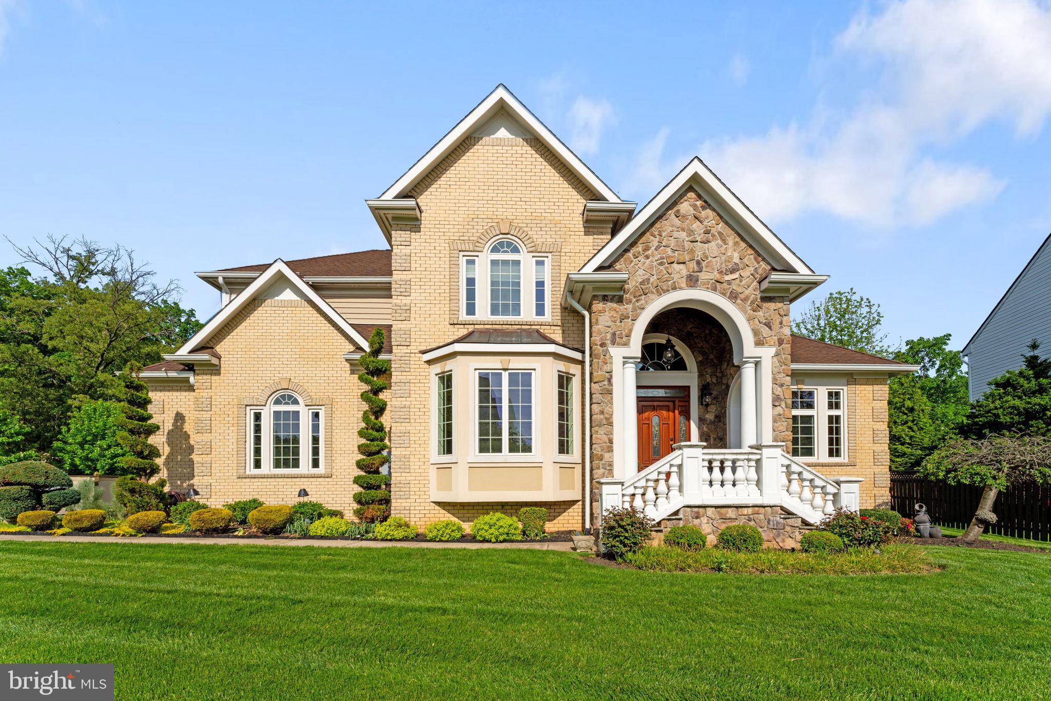Nestled in a serene, quiet community, this stunning custom-built residence is a masterpiece! Featuring exquisite Brazilian hardwood and upscale gourmet appliances, it's designed for both elegance and comfort.
Highlights include:
- Chic granite countertops paired with beautiful cherry cabinets
- A cozy family room seamlessly flowing from the kitchen
- A sunroom boasting soaring cathedral ceilings
- A luxurious Jacuzzi in the primary bedroom with stylish granite vanities 
Additionally, enjoy clever features like central vacuum, custom lighting, and a spacious lower level complete with a wet bar, an office, and an inviting in-law suite.
A must see!
