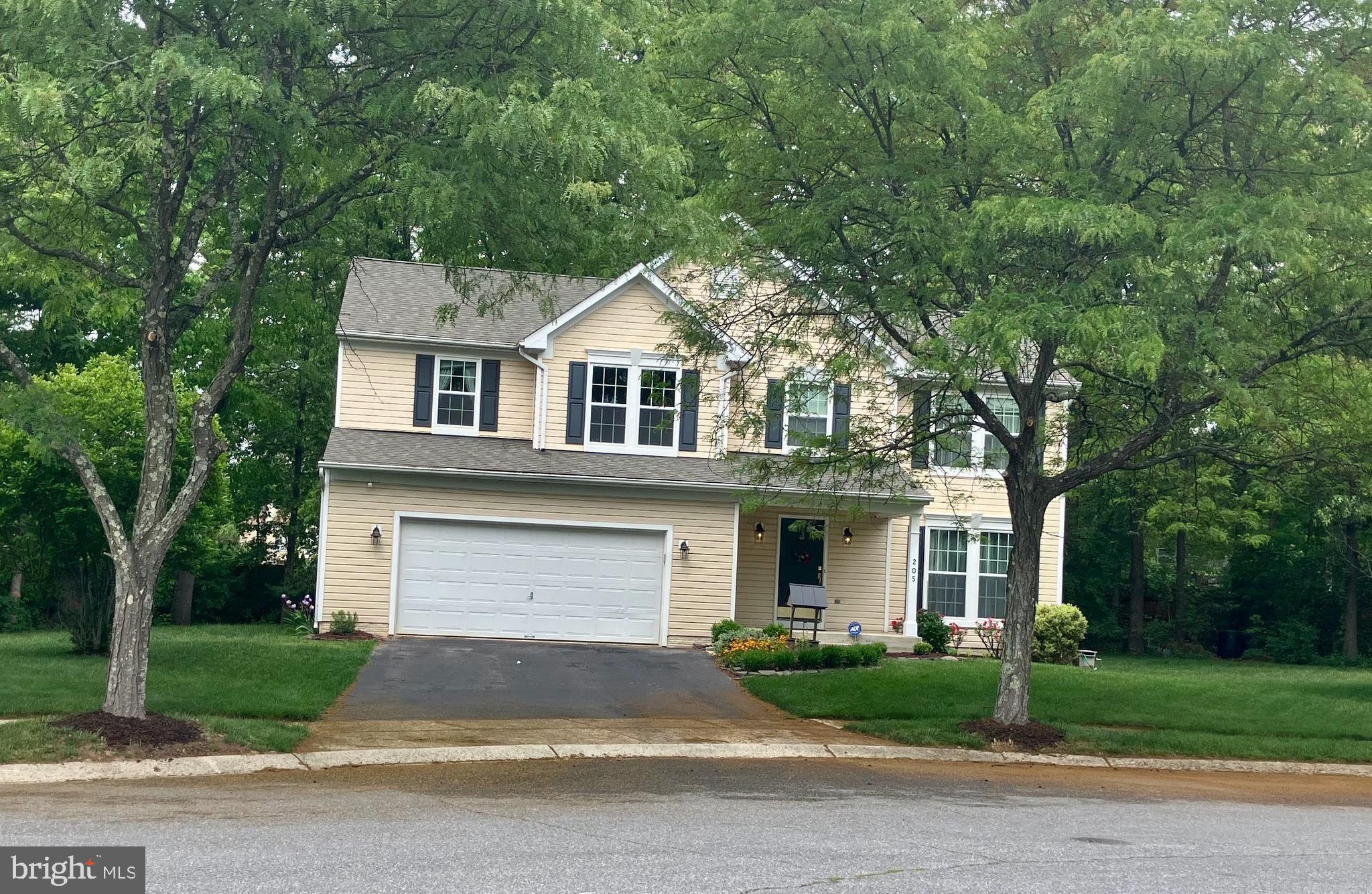 COMING SOON!  Lovingly maintained one-owner turnkey home in the coveted Fox Chase community!  The main level is full of charm.  The recently remodeled kitchen (2025) boasts solid-maple cabinets with soft-close hinges and dovetailed drawers, luxury quartz countertops, stainless steel appliances, including top-of-the-line refrigerator and dishwasher and an upgraded GE microwave  and stove, plus a heated ceramic floor for comfort.  Just off the kitchen, a maintenance-free screened porch is the perfect place to gather and recharge surrounded by trees and nature.  This level also features cherry hardwood floors throughout and a king-size family room.  On the upper level, you'll find an oversized primary bedroom with walk-in closet and a spa-inspired remodeled primary bath (2025) that features designer porcelain tile, shower with a folding teak bench, and an upgraded vanity with quartz countertop and medicine cabinets. Four other bedrooms are also found on this level --  one of these bedrooms could be considered another primary bedroom due to its size.  Finally, there is an additional hall bathroom with tub/shower combination.  The lower level offers a recreation room with brand new LVT (pet & kid-friendly  --  2026),  laundry room, and plenty of extra storage space. 
Throughout the home, you'll delight in:  
*Extra space options offered by builder were added to all rooms. 
*Premium lighting (ceiling fans with remotes, puck lights, dimmer switches, and recessed lighting).
*Fresh paint and carpet.
*Recent updates include the roof (2022), HVAC (2024), windows (2024), and washer (2025). 
Fantastic cul-de-sac location has abundant parking and is convenient to major travel routes, shopping, and restaurants.   Don't miss this one!