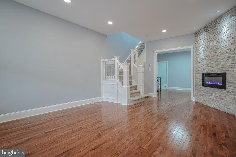 Welcome to 4419 Richmond Street where every detail was redone. Located in Bridesburg this home has two great outdoor spaces with the front porch and rear yard with new deck! Once inside your beautiful home you and your guests will notice the beautiful accent wall fireplace with recessed lighting. The new hardwood floors are a perfect compliment to the freshly painted neutral paint color through out the home. The kitchen is a true beauty with the new cabinets, granite counters and Samsung Stainless steel appliances! A powder room finishes off the first level to give your guests an easy commute while hanging out on the back porch! Once upstairs you will see three large sized bedrooms with new carpeting throughout the upstairs. New tiled bathroom and vanity toilet combo complete the upstairs bath. Down in the basement you will notice the large full length space from back to front of the house, perfect for storage or carpeting and you can have more livable space! We welcome your visit today!
