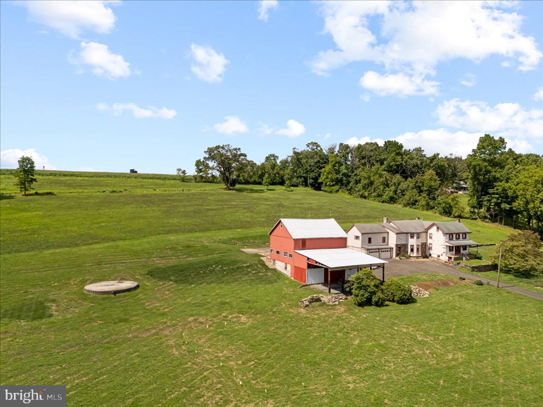 Set along picturesque Curly Hill Road in Plumstead Township, this original stone 
farmhouse and property offer the rare opportunity to restore and create a classic Bucks 
County farmhouse estate. For those who want to engage in agriculture, equestrian sports, 
or want to be live with an awareness of the natural environment this property is enrolled 
under Pennsylvania’s Clean and Green Program (ACT 319) which maintains the scenic 
natural character of the area while offering favorable tax benefits. Dating to the mid-1800s, the farmhouse and traditional barn sit on open land surrounded by preserved farmland and quiet countryside, offering a setting that reflects the timeless rural character of rural Bucks County. This peaceful rural setting is complemented by exceptional convenience, located just minutes from the historic borough of Doylestown’s vibrant town center, known for its restaurants, museums, and cultural destinations, it is a 
perfect balance of privacy, open space, and convenience. The original stone farmhouse offers an exceptional opportunity for restoration and preservation, ensuring that the architectural character of the home remains part of the landscape for generations to come.  For buyers who value timeless rural architecture, this property presents a meaningful opportunity to restore and reimagine a period home.
A rare once in a generation chance to steward a piece of Bucks County history while creating a distinctive country retreat. DO NOT WALK LAND WITHOUT A CONFIMRED APPOINTMENT- ALL SHOWINGS ARE ACCOMPANIED>PROPERTY IS UNDER SURVEILLANCE