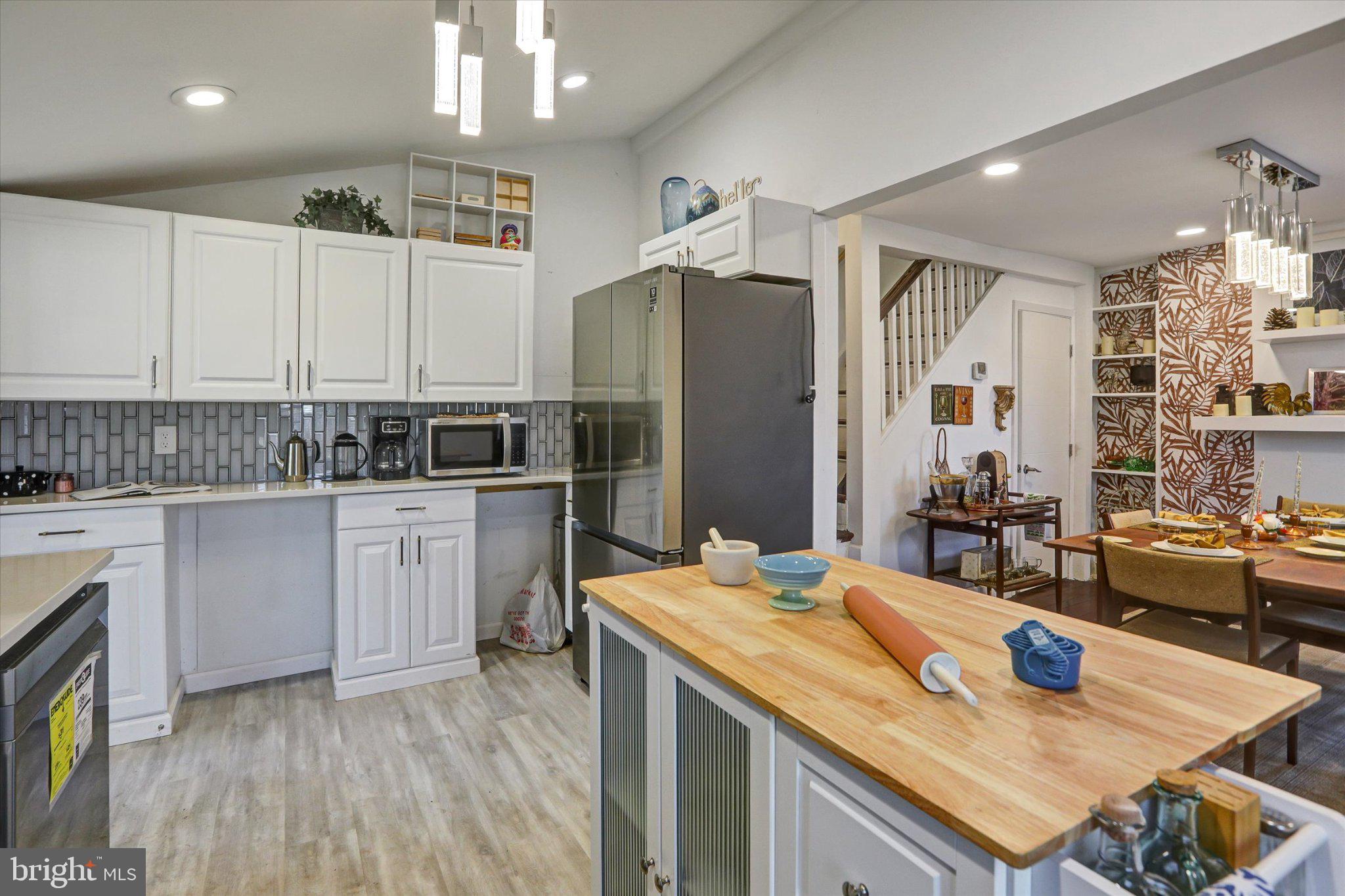 Step inside this bright, stylish Hampden home offering a blend of modern updates and classic Baltimore charm. The main level features an open flow from the living room to the dining area and into a beautifully updated kitchen with white cabinetry, stainless steel appliances, wood countertops, and a sleek tile backsplash. Natural light fills the space, highlighting the home’s character, warm finishes, and thoughtful design. Upstairs, you’ll find comfortable bedrooms with great light and flexible layout options. Enjoy morning coffee or evening downtime on the private balcony overlooking the neighborhood. The backyard provides additional outdoor space for entertaining, gardening, or creating your own city retreat. Located steps from The Avenue, parks, restaurants, and everything Hampden has to offer, this home delivers walkability, convenience, and a lifestyle buyers love. Easy access to I‑83, downtown, and surrounding neighborhoods makes commuting simple.
A great opportunity to own a move‑in ready home in one of Baltimore’s most vibrant communities.