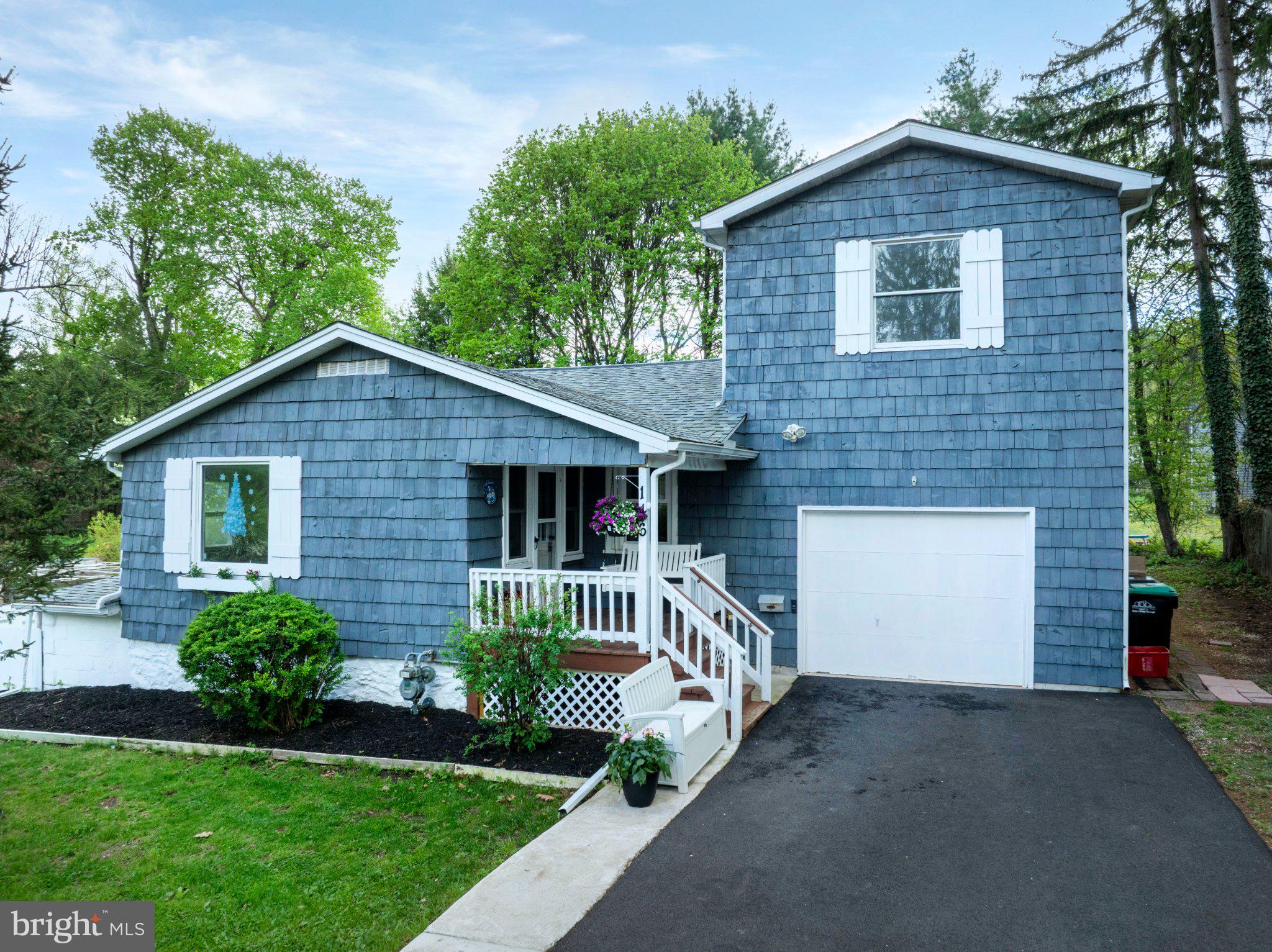 Tucked along a quiet street in the former Manor Hills neighborhood of State College Borough, this freshly painted inviting home blends partial log framing with the warmth and character of a cozy Cape-style retreat. Recent updates include a new roof, new ductless mini-split system and newly installed driveway, providing added value and peace of mind. The property also holds an active rental permit, offering excellent flexibility for both owner-occupants and investors.Its prime location—just steps from Lederer Park and Walnut Springs Park—offers easy access to downtown, shopping, Penn State University, Beaver Stadium, Easterly Parkway Elementary, State College Area High School, Welch Pool, and more. Start your day with a peaceful moment on the front porch swing, or relax on the rear deck just off the first-floor bedroom, where you can take in the calming sounds of nature. Upstairs, you'll find three additional bedrooms and a shared full bath, while the partially finished basement adds flexibility with a separate room featuring a walk-out slider to the yard, along with an additional full bath. The generous side yard, once used for gardening, enjoys abundant sunlight, and the remaining outdoor space offers a blank canvas ready for your personal touch.