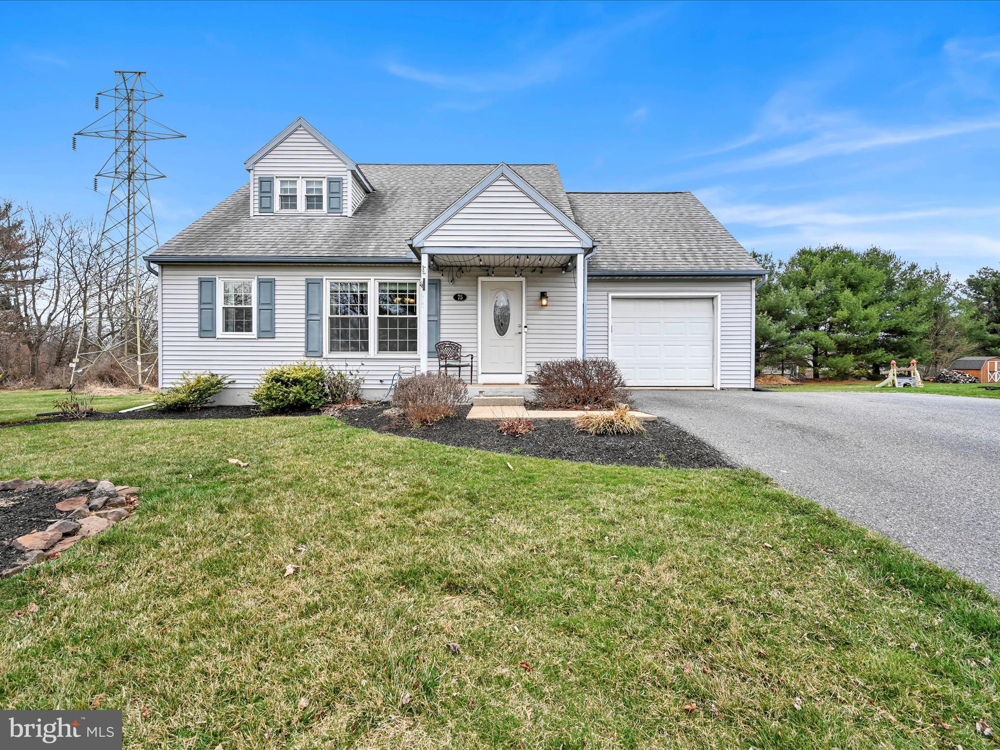 Welcome to 75 Hollow Road in the desirable Village Hollow neighborhood. This beautiful home sits on one of the largest lots in the neighborhood. Thoughtfully updated, it features luxury vinyl plank flooring throughout the entire first floor. The updated kitchen boasts granite countertops, stainless steel appliances, and a center island with a sink—perfect for meal prep and gathering.

The stunning main-level family room addition is a true highlight, offering a vaulted ceiling, a cozy gas fireplace, and direct access to the deck and pool. Designed for entertaining, the open floor plan includes a spacious dining room, while the finished lower level provides a second family room complete with a home theater—yours to enjoy!

Step outside to your private, tree-lined backyard featuring a stone fire pit, and large pool, creating the ultimate retreat. Don't miss this incredible opportunity to own a home that perfectly balances comfort, style, and space!