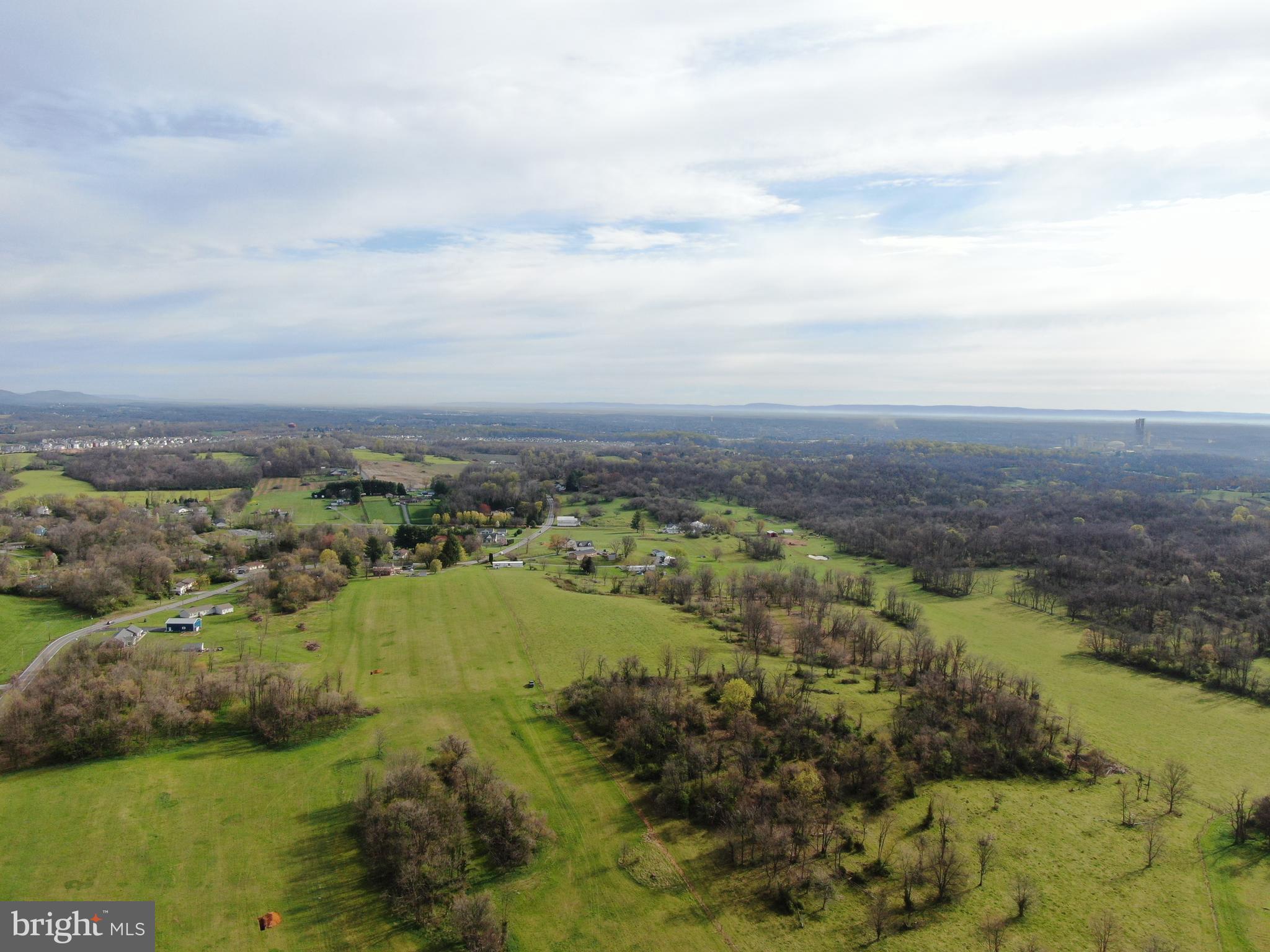 COME AND MAKE THIS PROPERTY YOUR OWN PRIVATE OASIS! These beautiful 131.13+- Acres will be offered in 3 tracts, combinations of tracts, and as a whole! The property is located approx. 2 miles from I-81 exit 12, and approx. 1.5 miles from I-81 exit 8 Tabler Station Rd. This incredible property has approx. 53 acres fenced with high tensile fencing as well as multiple cattle waterers. Approx. 45 acres tillable with Hagerstown Limestone and funkstown silt loam soils! Beautiful wooded acreage on the property has mature timber and tons of wildlife! This property is a perfect chance to own your own piece of heaven far enough away to be private, but close enough that all your amenities are within 5 minutes! All 3 parcels will be perced prior to the auction! 
Tract 1: 42.67+- Acres with tillable acreage, fenced pastures, and wooded ground with tons of wildlife! Road frontage with a proposed driveway entrance off of Apple Harvest Dr. 
Tract 2: 65.18+- Acres with tillable acreage, fenced pastures, and wooded ground with tons of wildlife! Road frontage and a proposed driveway entrance off of Apple Harvest Dr. 
Tract 3: 23.28+- Acres with tillable acreage, fenced pasture and road frontage and a proposed drive way entrance off of Apple Harvest Dr. 
This truly is a once in a lifetime opportunity to own a piece of paradise! Settlement is contingent upon subdivision approval. This property will be offered at auction on Friday, May 17, 2024 @ 3:00PM.