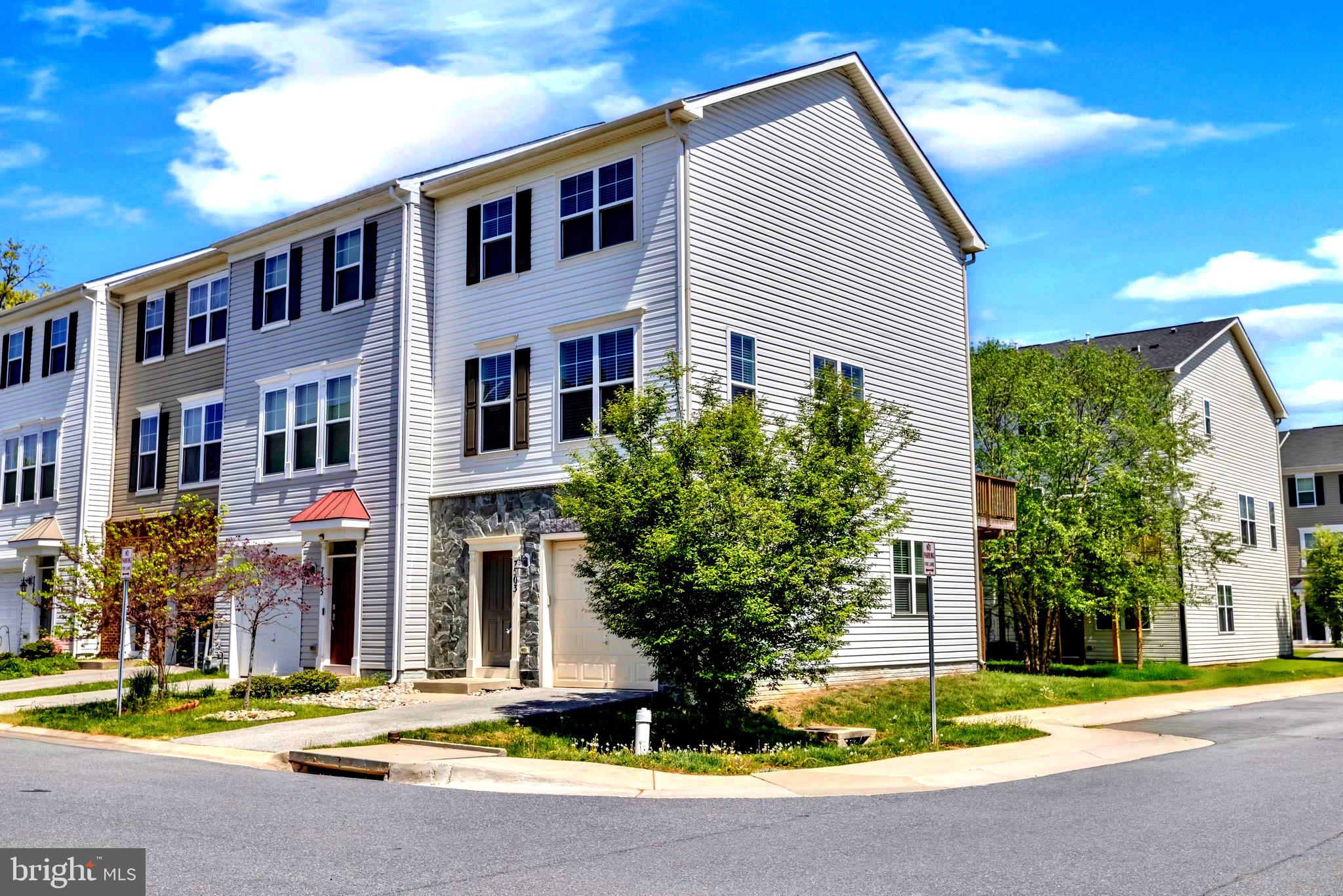 ATTENTION ACTIVE-DUTY MILITARY AND VETERANS: VA ASSUMABLE LOAN AVAILABLE AT 2.75%

ALSO, HAS STATE-OF-THE-ART WATER PURIFYING SYSTEM; ELIMINATES HARD WATER.

Discover this beautifully maintained end-unit townhome with an attractive 1/3 stone front, nestled in the gated community of Oakview Village. Offering 3 bedrooms, 2 full baths, and 2 half baths, this home combines comfort, space, and style. Enjoy a private wooded deck, perfect for relaxing or entertaining, and a top-tier water purification system. 

The main living area features a spacious kitchen complete with an appliance package, gas range, and center island. Upstairs, you’ll find a convenient laundry area and two primary suites, each with its own walk-in closet. The finished lower level provides flexible space for a recreation room, home office, or guest retreat, along with an additional half bath.