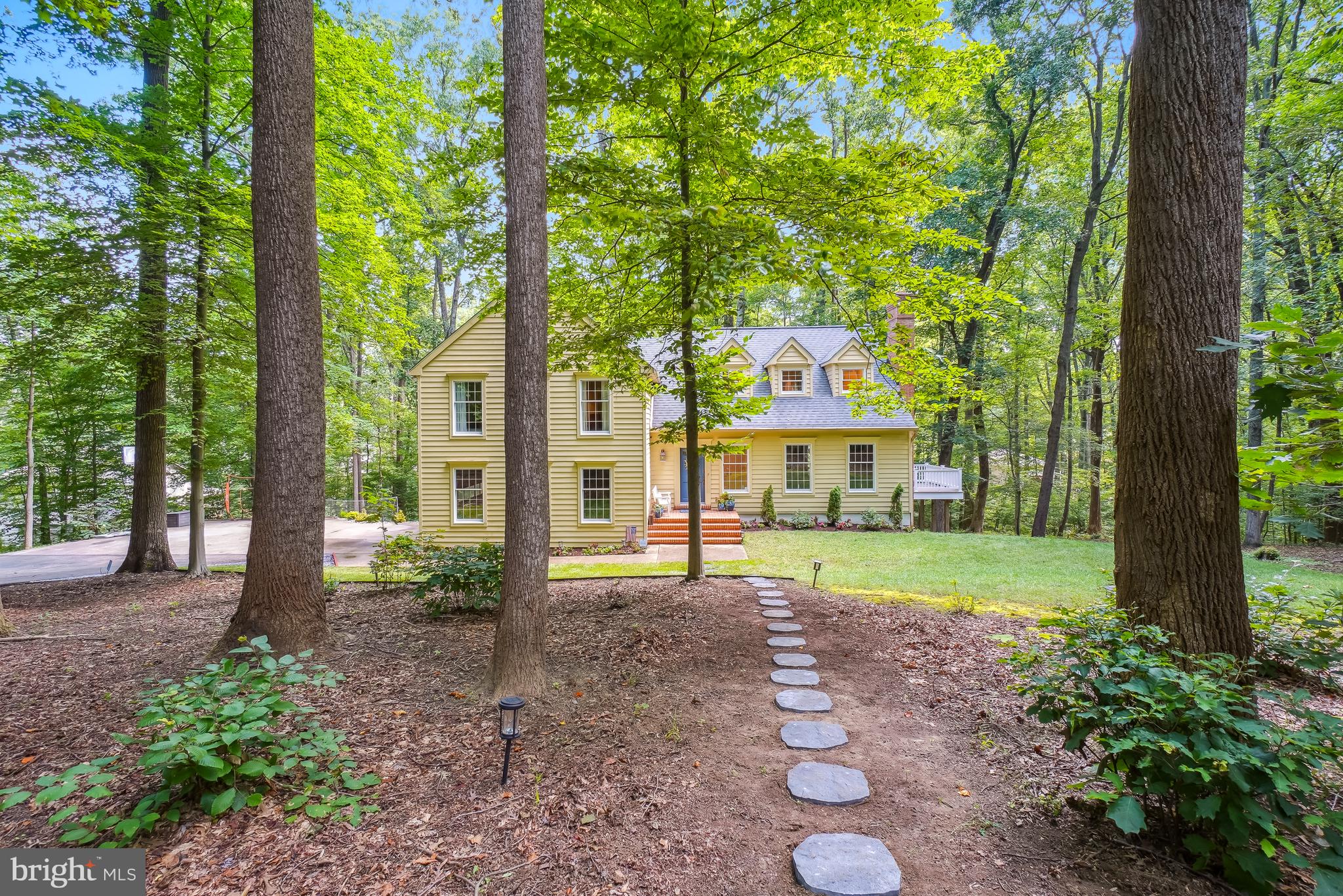 Don't miss this thoughtfully renovated home on a private lot in sought-after Harbor Hills community filled with great amenities along the South River. This spacious home features four bedrooms (with an option for a fifth up) plus a guest suite in the lower level and 3.5 baths, the home is designed for both everyday living and easy entertaining. The main level centers around a light-filled eat-in kitchen that opens seamlessly to the family room, where a wood-burning stove creates a warm and inviting gathering space. A charming living room offers the perfect spot to unwind in the evenings with a second wood burning fireplace, full of character and timeless appeal. Just off the kitchen is one of two decks so start planning those summer dinners and relaxed nights outdoors  and don't miss the second deck providing a peaceful setting for morning coffee overlooking the backyard. Upstairs, you’ll find four generously sized bedrooms and two full baths, including a spacious primary suite with dual closets. A private office or flexible bonus space just off the primary is perfect for working from home or a personal gym. Convenient upper-level laundry adds to the home’s thoughtful layout. The lower level expands the living space with a recreation room and a private guest suite complete with a full bath. Additional highlights include ample parking and updates throughout the home. Located just off Route 50 making it convenient to Annapolis and Washington, D.C., Harbor Hills offers an unmatched blend of convenience and lifestyle. This water-privileged community features a 49-slip marina (slips subject to availability), clubhouse, Olympic-size community pool, tennis courts, ball field, and a private beach area with pavilion, pier, kayak storage, and boat launch. Residents enjoy a vibrant social calendar and a true sense of community. Tour this home today! It's special!