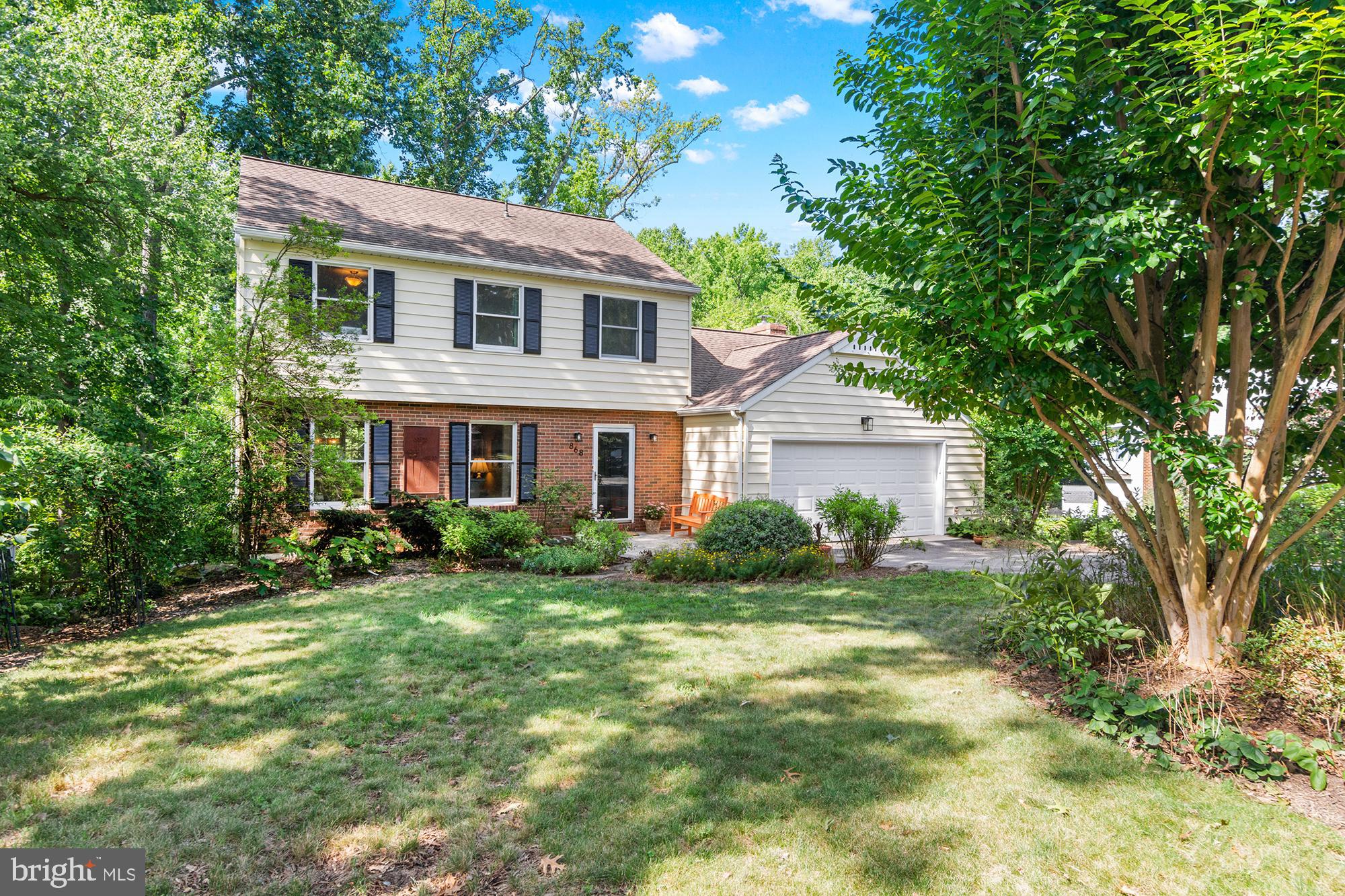 OPEN HOUSE SAT JULY 11th 11-1PM. Welcome to Twin Harbors—a waterfront community where neighbors become friends and residents rarely want to leave. This home has been lovingly maintained and updated by the same owner for over 30 years. This colonial style home offers 3 finished levels, an all season porch off the kitchen, and the ultimate screened in porch off the lower level - think crab feast, wine parties, or just relaxing surrounded by nature. The backyard is not your typical backyard it is truly a native plant sanctuary. Take a walk back around the stone path professional hardscaping and soak in feel of nature. Inside the home has been tastefully updated over the years. Be sure to see full list of seller's improvements but to highlight - trek decking (2023), tile in entry way and 1/2 bathroom (2024), all kitchen appliances (less than 3 years old), owner's ensuite bathroom renovation (2015), painted interior and exterior (2026), hot water heater (2011), and roof (2018). The breakdown of the home is 3 bedrooms with easy potential 4th bedroom in lower level (walkout level) and 3.5 bathrooms. The main level layout offers everything you are looking for - front sitting room, separate dining room, a large kitchen with island open to the living room and all season porch off. The lower level is finished with open room to accommodate any of your needs (gym, playroom, office, 4th bedroom), full bathroom, and back storage/utility/laundry room. The house has central heating and cooling via geothermal HVAC system. The house also comes with a whole house generator - bonus! This neighborhood is a gem! As the website states, "Twin Harbors is more than a community, it is a lifestyle comprised of neighbors helping neighbors that live in one of the most beautiful areas on the Broadneck Peninsula." Through a voluntary community association fee of $175 annually, property owners can enjoy access to community amenities including a private beach, outdoor pavilion, playground, shared pier access, marina, and available boat slips. Downtown Annapolis, the Naval Academy, and City Dock are a short drive away, along with convenient access to Route 50 and major commuter routes to Washington, D.C., and Baltimore