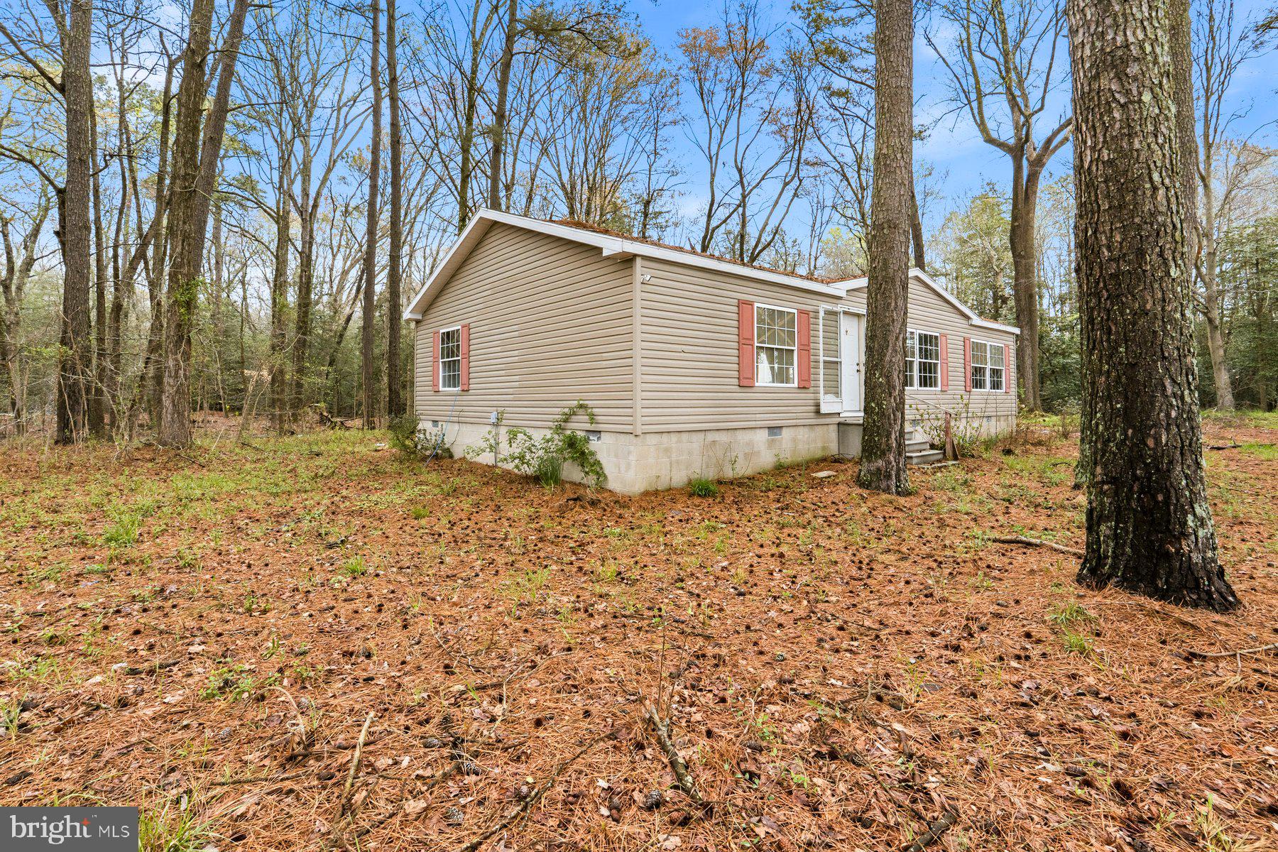 NOW WITH NEW WELL PUMP!! Opportunity awaits at 8434 Hurleys Neck Rd! Nestled on over 4 private acres in scenic Wicomico County, this 3-bedroom, 2-bath manufactured home on a permanent foundation offers a rare blend of space, privacy, and upside. The property has been fully cleaned out and is now cleared of all belongings, making it easy to walk through, assess, and start planning your vision right away. With a spacious layout and peaceful natural surroundings, this home is the perfect canvas for a buyer looking to build equity or an investor seeking their next value-add opportunity.

While the home does need repairs and updates, the potential here is undeniable — whether you’re looking to renovate, rent, or create your own private retreat on acreage. Property is being sold strictly AS-IS. Now open for access and walkthroughs — schedule your showing and explore the possibilities today!
