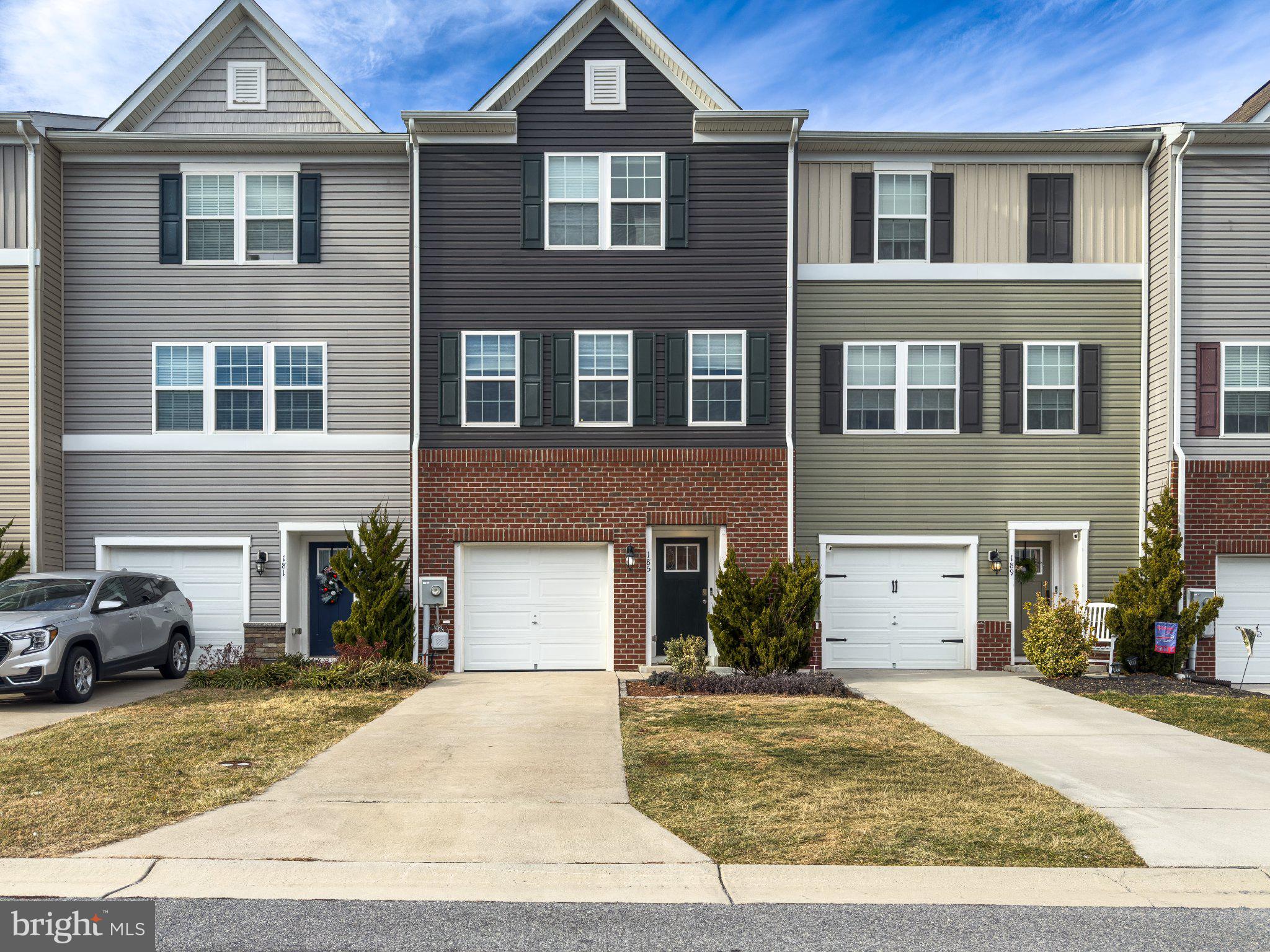 Don't Miss This Incredible Opportunity!
Priced to sell and loaded with upgrades, this spacious three-level townhouse in the desirable Berkeley Ridge community is move-in ready and offers exceptional value.
Built in 2020, this beautifully maintained Colonial-style home features 3 bedrooms, 2.5 bathrooms, and a bright open-concept main level designed for comfortable everyday living and effortless entertaining. The expansive living area flows seamlessly into the dining space and well-appointed kitchen, complete with a center island, upgraded countertops, built-in microwave, self-cleaning oven, dishwasher, refrigerator, and a generous walk-in pantry.
Thoughtful upgrades can be found throughout the home, including lighted ceiling fans in four rooms, high ceilings, and a security system for added peace of mind.
The fully finished lower level provides versatile living space that is ideal as a family room, recreation room, home office, or guest retreat. This level features upgraded pet-friendly luxury vinyl plank flooring that is waterproof, durable, and easy to maintain, along with direct walkout access to a private patio enclosed by a fully fenced backyard—perfect for entertaining, pets, play, or relaxing evenings outdoors. The upper levels feature comfortable carpeting that adds warmth and coziness throughout the living spaces.
Step outside onto the premium maintenance-free deck, constructed with high-end materials for long-term durability and minimal upkeep, creating the perfect setting for outdoor gatherings and morning coffee.
Additional highlights include:

Attached garage
Upper-level laundry
Fully fenced backyard with privacy patio
Finished walkout lower level
Open-concept floor plan
Abundant storage and walk-in pantry
Community sidewalks and common areas

Residents of Berkeley Ridge enjoy a convenient location near local schools, commuter routes, and outdoor recreation. The Williamsport C&O Canal National Historical Park is just minutes away, offering hiking, biking, and boating opportunities, while a commuter rail station is located within five miles.
With the seller's recent price reduction and premium upgrades throughout—including the maintenance-free deck, upgraded flooring, fenced outdoor living space, and lighted ceiling fans—this home represents an outstanding opportunity for first-time buyers, growing families, and empty nesters alike.
Schedule your private tour today and discover the comfort, convenience, and value this exceptional Berkeley Ridge home has to offer.