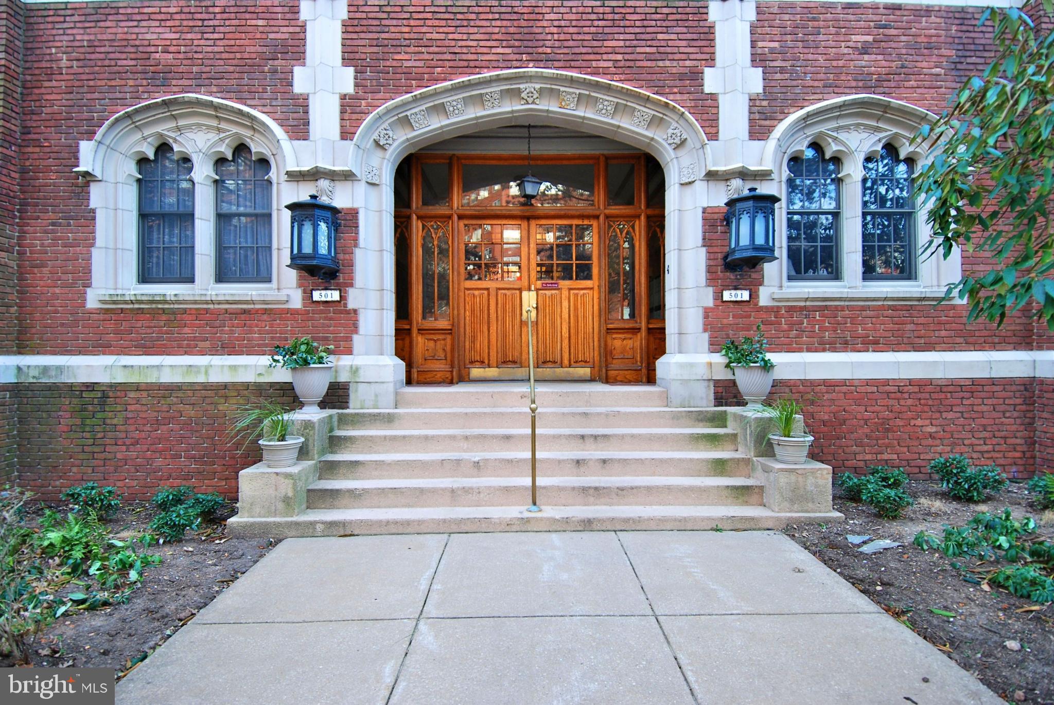 Own a unique piece of Baltimore history; Tudor Arms, the oldest and largest co-op in the area! A five story brick building of grand Tudor design and meticulous detail. This lovely 2BR, 1 Full Bath apartment is located on the third floor and features 1160 square feet and seamlessly blends the classic architectural detail with modern conveniences. This thoughtfully designed apartment has light on 3 sides, large open rooms, huge closets, and gleaming hardwood floors throughout. The EAT-IN kitchen has many updates such as Quartz counter tops, stainless steel appliances, refrigerator w/ freezer, built in microwave, GE oven/range, and luxury corked backed flooring. This is a true cook's kitchen with a walk-in pantry in the adjoining hallway for all your baking needs! Enjoy your morning coffee in the sun room just off of the kitchen featuring a wall of windows. The second bedroom affords privacy with beautiful french glass doors that  would also function great as a home office! The primary bedroom is conveniently located near hall bath  and offers a huge Cedar closet as well as an additional storage closet with shelving and beautiful hardwoods. Unique to co-ops, the monthly fee covers your heat, water, AND taxes! Building amenities include an elevator, a 5th floor storage room that accompanies this unit, shared laundry in the basement, and a secure front entrance with lobby and mail room. Owner occupancy only, please review coop docs and buyer's application upon submission of a contract. Tudor Arms borders Wyman Park and the Johns Hopkins Homewood campus, and is within walking distance to the Hampden 36th Street restaurant district, the Baltimore Museum of Art, and the redeveloped Rotunda shopping mall. This charming apartment has lots to offer, come tour today!