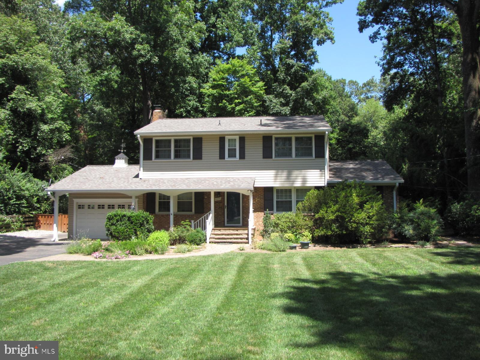 Wonderful 4BR/2.5 bath home with nearly a half acre lot! This property has 3 levels with an attached garage, screened in back porch and deck. Updated kitchen w/huge pantry, updated baths and hardwood floors on main & upper levels.  Updated LL Rec room. Great storage. Laundry room. Long driveway w/turnarounds.