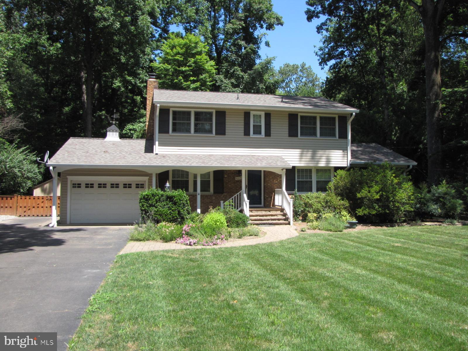 Wonderful 4BR/2.5 bath home with nearly a half acre lot! This property has 3 levels with an attached garage, screened in back porch and deck. Updated kitchen w/huge pantry, updated baths and hardwood floors on main & upper levels.  Updated LL Rec room. Great storage. Laundry room. Long driveway w/turnarounds.