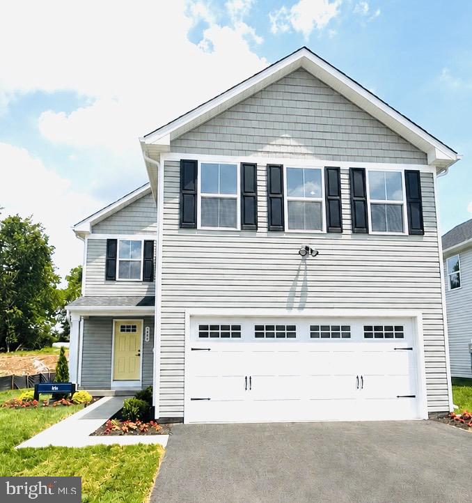 Rare find! This is currently the only newly built home in the area ready for immediate move-in single-family home in Kilpatrick Woods! The Iris offers the perfect combination of space, style, and value—with premium upgrades already included.
This home comes fully equipped with brand-new stainless-steel appliances, washer and dryer, garage door opener, quartz countertops, and a covered porch, so you can move in with confidence and no extra expenses.
Step inside to a welcoming open-concept layout, where the spacious great room flows effortlessly into the kitchen, dining area, and breakfast bar, ideal for everyday living and entertaining.
Upstairs, you’ll find three generously sized secondary bedrooms with ample closet space and a shared full bath, while the private owner’s suite offers a relaxing retreat with a large walk-in closet and an en-suite bath featuring dual vanities.
A 2-car garage and unfinished basement provide plenty of storage and flexibility for future growth.
Enjoy the benefits of all-new construction—energy efficiency, low maintenance, and no costly repairs—making this the smart choice for today’s buyer.
👉 Why wait months to build when you can move into a brand-new home this fall?
👉 Limited quick move-in opportunities available, schedule your visit today before it’s gone.