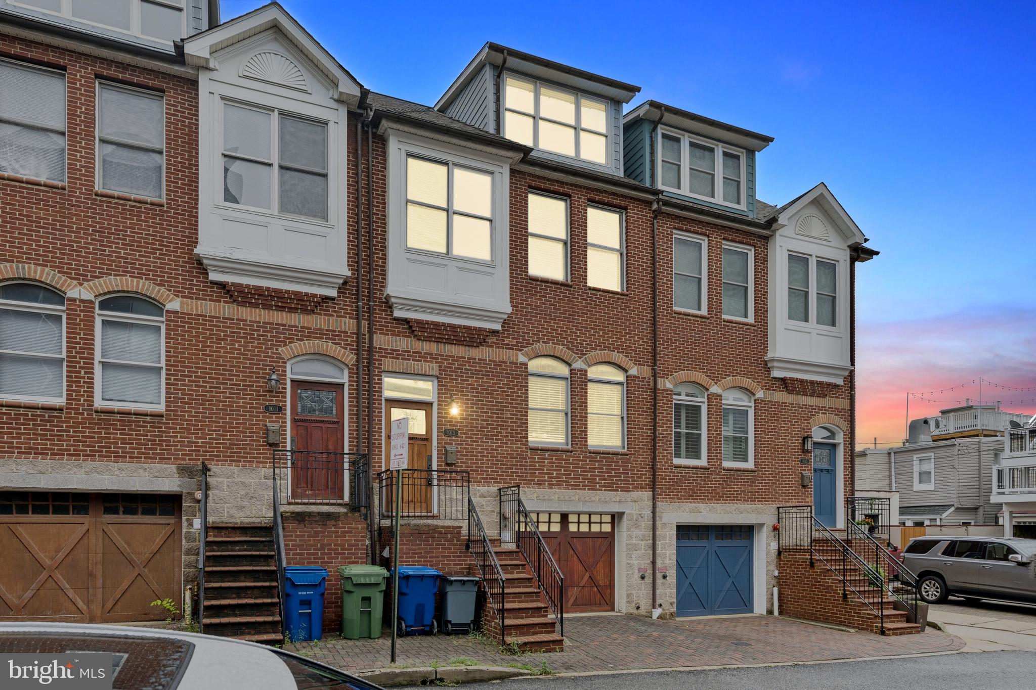 GORGEOUS TOWNHOME LOCATED IN THE HEART OF CANTON JUST STEPS FROM CANTON SQUARE WITH 2 CAR GARAGE PARKING NOW AVAILABLE. 4 BEDROOMS WITH 3 FULL BATHROOMS. STUNNING NON-OBSTRUCTED VIEWS OF CITY SKYLINE. GLISTENING HARDWOODS CASCADE THROUGHOUT. ENJOY CUSTOM CABINETRY, IMPORTED TILE, RECESSED LIGHTING, GRANITE COUNTERTOPS, TILE BACKSPLASH, SS APPLIANCES IN DESIGNER CHEF'S KITCHEN WITH OVERSIZED ISLAND AND BREAKFAST BAR. PRIVATE PATIO OFF KITCHEN - GREAT FOR ENTERTAINING. CROWN MOLDING THROUGHOUT. LOADS OF NATURAL LIGHT. FIREPLACE. TALL CEILINGS THROUGHOUT. WALK-IN SHOWERS. WALK-IN CLOSETS. CLOSE PROXIMITY TO RETAIL SHOPPING, LOCAL DINING, CANTON SQUARE, CANTON CROSSING, INNER HARBOR, AND ALL MAJOR HIGHWAYS. SCHEDULE A PRIVATE TOUR TODAY!