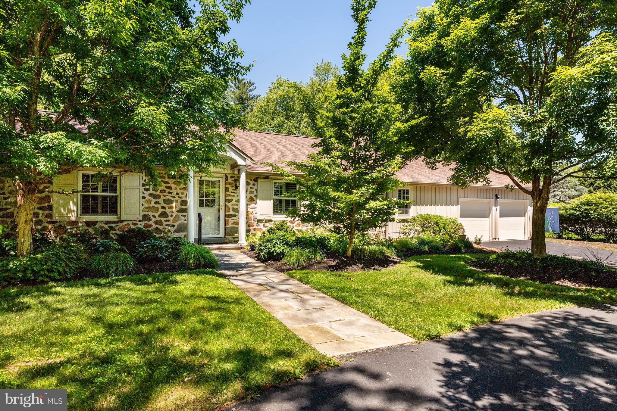 Welcome to 223 Upper Gulph Road, a beautifully maintained fieldstone ranch home in Wayne's desirable Shand Tract neighborhood and award-winning Tredyffrin/Easttown School District. Offering 4 bedrooms and 3 full baths, this home combines classic charm with thoughtful updates and an inviting open layout.

The interior features hardwood flooring, vaulted ceilings, built-ins, oversized windows, dual HVAC systems, and two fireplaces. Enhanced by a significant addition that expanded the family room, kitchen, and main bedroom suite, the home offers generous living space throughout. A spacious family room with a stone fireplace flows into the expansive eat-in kitchen, complete with white cabinetry, granite countertops, high-end appliances, a wet bar, skylights, and access to the rear deck. A separate fireside living room and formal dining room provide additional gathering spaces for entertaining and everyday living. The main bedroom suite includes a vaulted ceiling, private deck access, and a full bath, while three additional bedrooms and two additional baths provide comfortable accommodations.

Outside, the private landscaped backyard offers a peaceful setting with a waterfall, mature plantings, a garden shed, and an expansive Trex-style deck with built-in seating and a pergola. A circular driveway, attached two-car garage, and a new roof and skylights installed in 2025 add to the home's appeal. Conveniently located near Wayne's shops, restaurants, train service, and major routes, 223 Upper Gulph Road presents an exceptional opportunity in one of the Main Line's most desirable neighborhoods.