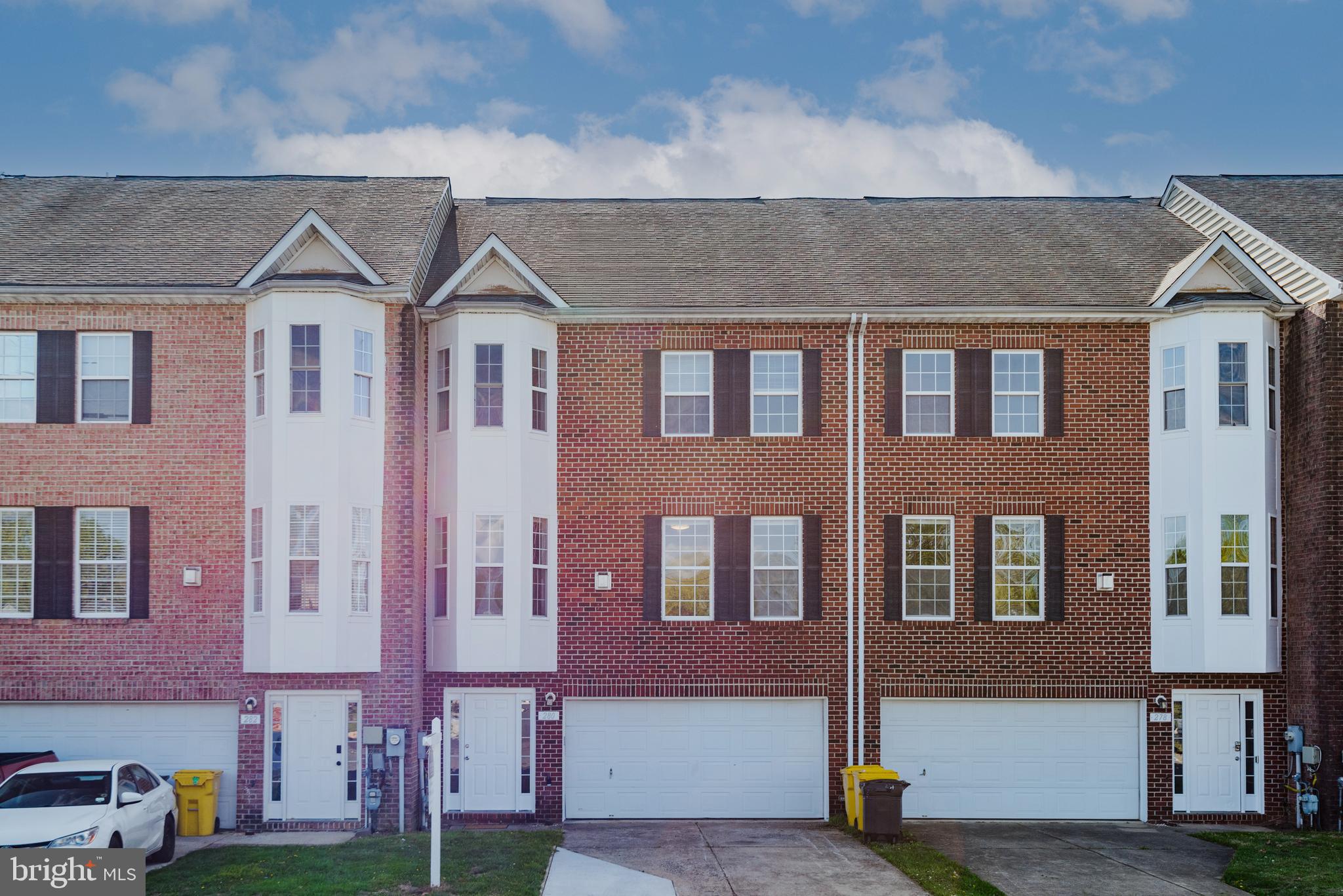 ****SELLER WILL PAY 1 POINT TOWARDS PURCHASER'S RATE BUYDOWN!!!  Brick front townhome on an expanded lot offering four levels and over 3,200 square feet of contemporary living space—flooded with natural light throughout. (Note: tax records are incorrect.) The open, recently updated floor plan features high ceilings, gleaming hardwood floors, and a gas fireplace. The modern kitchen includes quartz counter tops, brand new appliances and French Doors that lead to large serene deck overlooking private park reserve. Separate laundry room with washer/dryer off the kitchen. Upstairs, the expansive primary suite offers a walk-in closet and spa-like bath with dual vanity, soaking tub, separate shower, and private water closet. The fourth-floor loft—complete with skylight—makes the perfect office, playroom, or guest retreat. The entry-level family room opens to a private fenced yard and patio, ideal for entertaining. A two-car front-loading garage adds convenience and storage. Backing to protected park-like green space with mature trees and open lawn—never to be developed—this home combines tranquility with accessibility. Conveniently located near BW Parkway, ICC, I-95, Fort Meade, and shopping