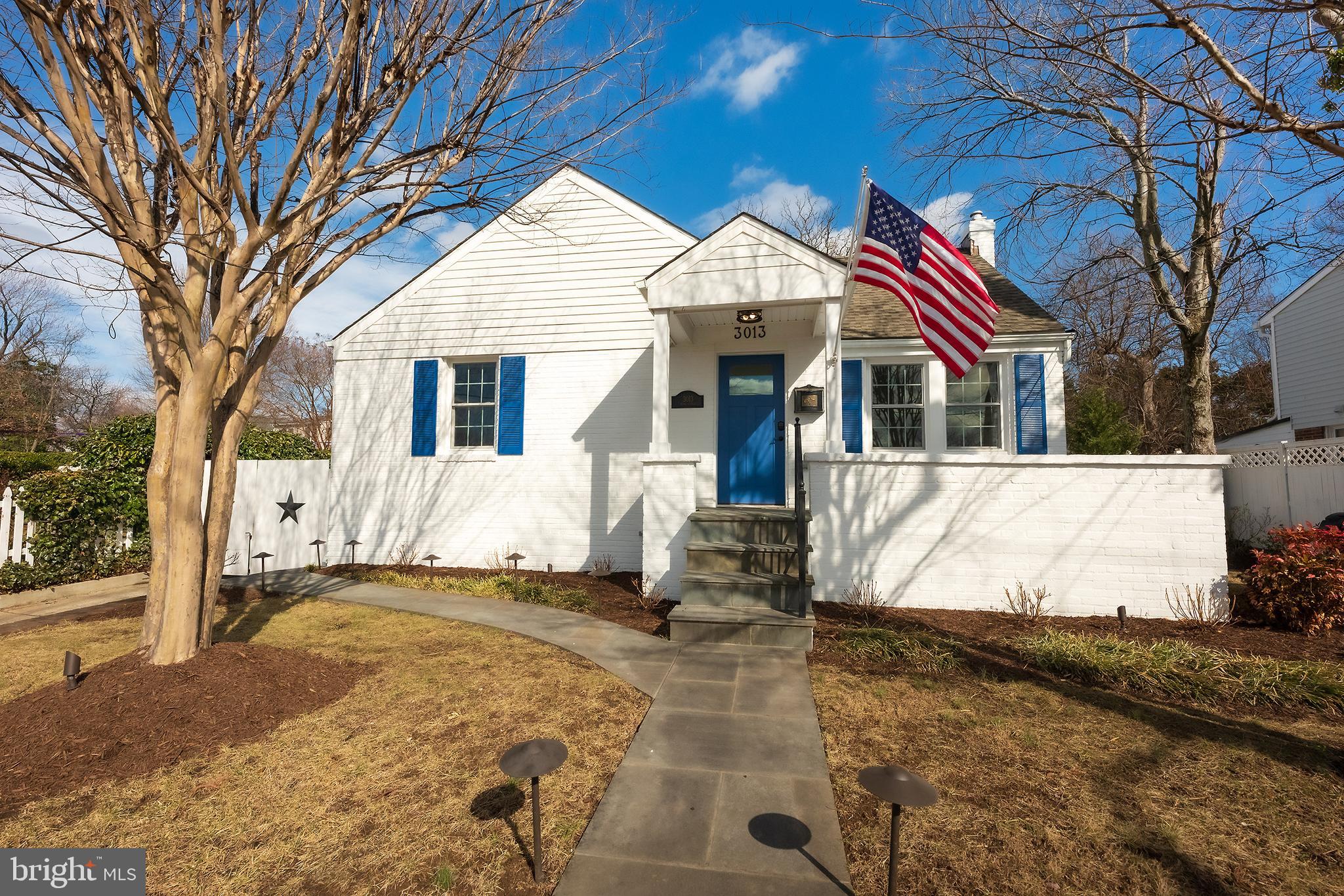 Incredible, top-to-bottom renovation of this expanded Cape Cod with family room/dining room addition, large backyard with patio, and parking in sought-after Rosemont location! Nearly the entire interior of this home is brand new - new kitchen, bathrooms, hardwood floors, dual-zone HVAC, plumbing, electric, windows, doors, insulation, light fixtures, and more. The main living space includes a classic living room with south-facing windows, the fully remodeled kitchen with GE Café appliances and marble countertops, an expansive dining room with cathedral ceilings and wet bar, an additional family room with a wall of windows looking out to the backyard, a custom mud room, and new powder room. The main level also offers two sizable bedrooms and a full bathroom with tub/shower combo. The second level then features the primary bedroom, a fully updated and oversized bathroom with dual vanity and lighted LED mirrors, a large walk-in closet, plus the home's fourth bedroom. The finished lower level offers an additional rec room or flex space, another full bathroom, and the laundry room. Outside you can enjoy the home's huge, fenced backyard, two stone patio spaces (perfect for grilling and entertaining), the charming front porch, mature landscaping, and parking for four in the driveway. All set in picturesque Rosemont - close to local parks, popular cafes in Del Ray, world-class dining in Old Town, the King Street Metro, mutliple grocery options, the Alexandria Waterfront, and easy commuting options aplenty. Welcome home!