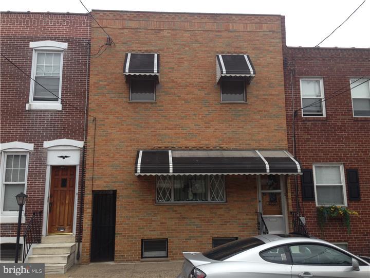 Very Rare Street to Street Home with A Detached two Car Garage on Livingston Street, Huge landscaped Yard with Working Outhouse on a Great Port Richmond Block that is Absolute Move in Condition.  This 3 bedroom 1.5 Bathroom "Retro" Home is Very Clean and Well Maintained by the same owner who was Born there.  Home Features a Beautiful Newer Brick Front, Marble Steps that Flat out Shine, and a Breezeway to Access the yard from Almond Street.  First Fl Features a Large open Living Room Dining Room Combo, Large Eat in Kitchen that Offers Ample Cabinets and Counter Space.  The 2nd Fl Feature 3 Bedrooms and a Full Bathroom; The Rear bedroom is Huge.  The Basement is of Builders Finish Quality with Clean Painted Walls, A 2nd Stove for those who like to Cook, and a Rear Room that was Formerly Used to Make Wine with the Grapes Grown in the Yard.  The Rear Yard is Awesome, Very Large and Well Manicured; Features an Outdoor Working Toilet, Access to Almond Street Via the Breezeway.  The Detached Garage is Also Accessible from the Yard and has an Covered Patio Area.  The Garage has Room for 2 Cars but is currently Split in Half with Parking on one side and the other half was used as a Workshop but you can use as you see fit.  The one Garage Door has been Removed and Replaced with a Standard Door.  Brand New Hot Water Heater, Newer Rubber Roof & Coated Recently, Wall to Wall Wool Rugs Still in Good Shape.  Marble Window Sills Throughout.  This Home just needs updating and is priced accordingly.  Port Richmond is catching on Fire, so Hurry Because this is a Chance of a Lifetime.....