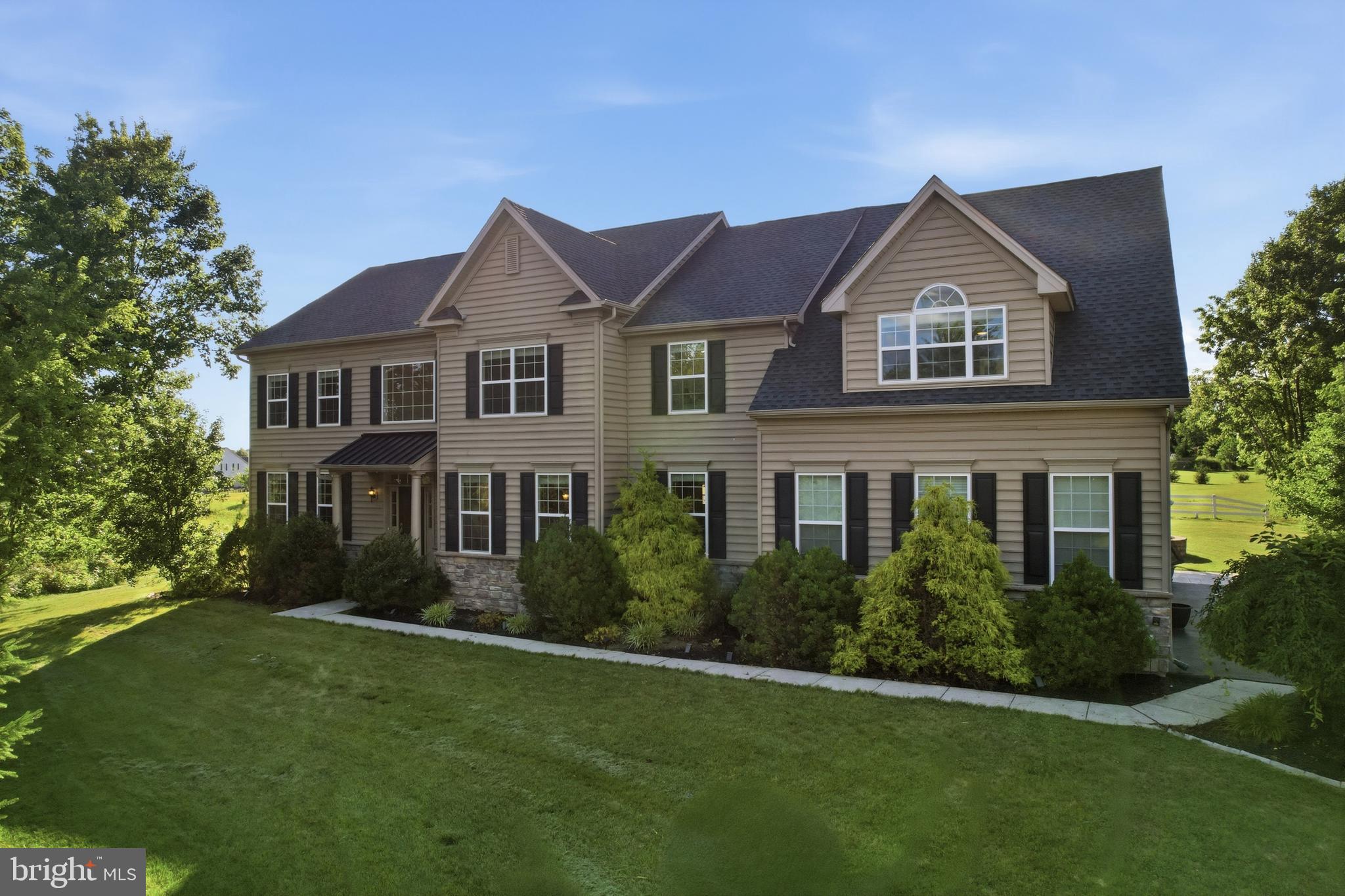 Nestled on a private 1.2-acre homesite, this exceptional custom residence offers the perfect blend of luxury, comfort, and convenience. Boasting approximately 4,400 square feet above grade plus an additional 1,400 square feet of beautifully finished lower-level living space, you don't want to miss this opportunity.
From the moment you step inside, you'll appreciate the expansive open floor plan, soaring ceilings, abundant natural light, and spacious rooms that create an inviting atmosphere for both everyday living and entertaining. The heart of the home flows effortlessly between the gourmet kitchen, dining area, and generous family room, making it ideal for gatherings of any size.
The finished lower level is an entertainer's dream, featuring an incredible movie theater room complete with premium surround sound, stadium seating, and custom theater lighting for an authentic cinematic experience right at home.  Perfect for family movie nights, or have your friends and family over to enjoy!
Step outside to your own private retreat where you'll enjoy a spacious deck, beautiful patio, and relaxing Jacuzzi hot tub overlooking the peaceful surroundings. Whether hosting friends or unwinding after a long day, this outdoor oasis offers year-round enjoyment.
Additional highlights include a very spacious primary bedroom with walk in closets, and sitting area as well.  
Located within an award-winning school district, this remarkable property offers the tranquility of a private estate while remaining just minutes from major parks, scenic hiking trails, shopping, dining, and everyday conveniences.
A rare opportunity to own this luxury home that offers exceptional space, privacy, and so much more, that simply needs to be seen to believe.   Schedule your tour today, or visit us at one of our open houses.