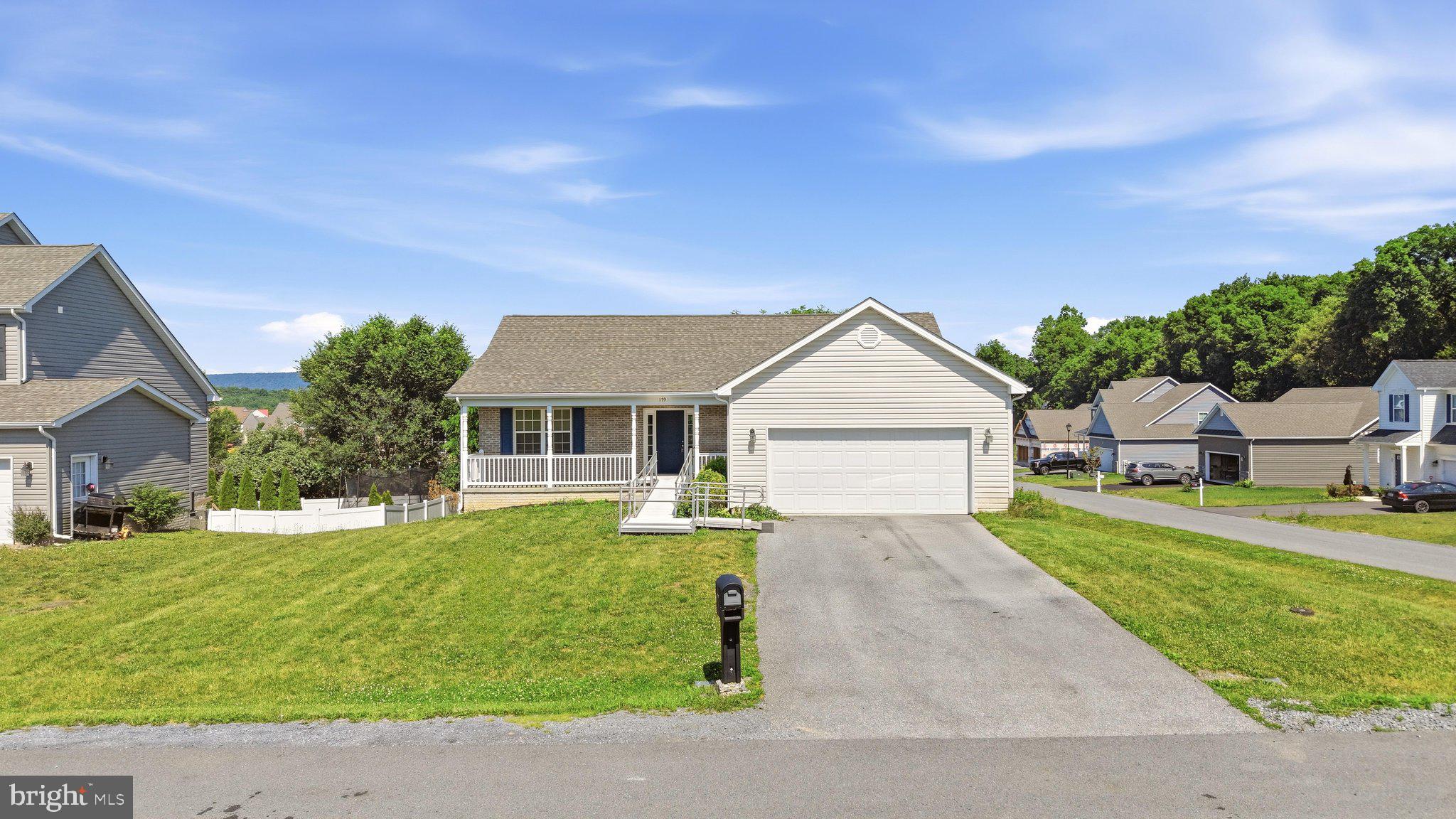 Welcome to 179 Reprisal Road, a beautifully maintained ranch home built in 2019, featuring a fully finished walkout basement and located in the highly desirable Stoney Ridge community.  Offering 5 bedrooms and 3 full bathrooms, this home boasts an open-concept layout with vaulted ceilings and hardwood flooring that seamlessly connect the living area and gourmet kitchen. Designed for both everyday living and entertaining, the kitchen showcases granite countertops, stainless steel appliances, abundant cabinetry, generous prep space, and a pantry for added storage.   The spacious primary suite features a walk-in closet and private ensuite bath, while two additional bedrooms and a full bath are thoughtfully positioned on the opposite side of the home. Step outside to the 10x12 rear deck overlooking the backyard, perfect for relaxing or gathering with friends and family. The finished lower level offers a large recreation room ideal for a media space, game room, home gym, or play area, along with two additional bedrooms, a full bathroom, and direct walkout access to the yard.  Completing the property is an oversized, fully insulated two-car garage. Combining comfort, style, and functionality, this exceptional home is just minutes from I-81, shopping, dining, and entertainment. Schedule your private tour today and discover all that 179 Reprisal Road has to offer!