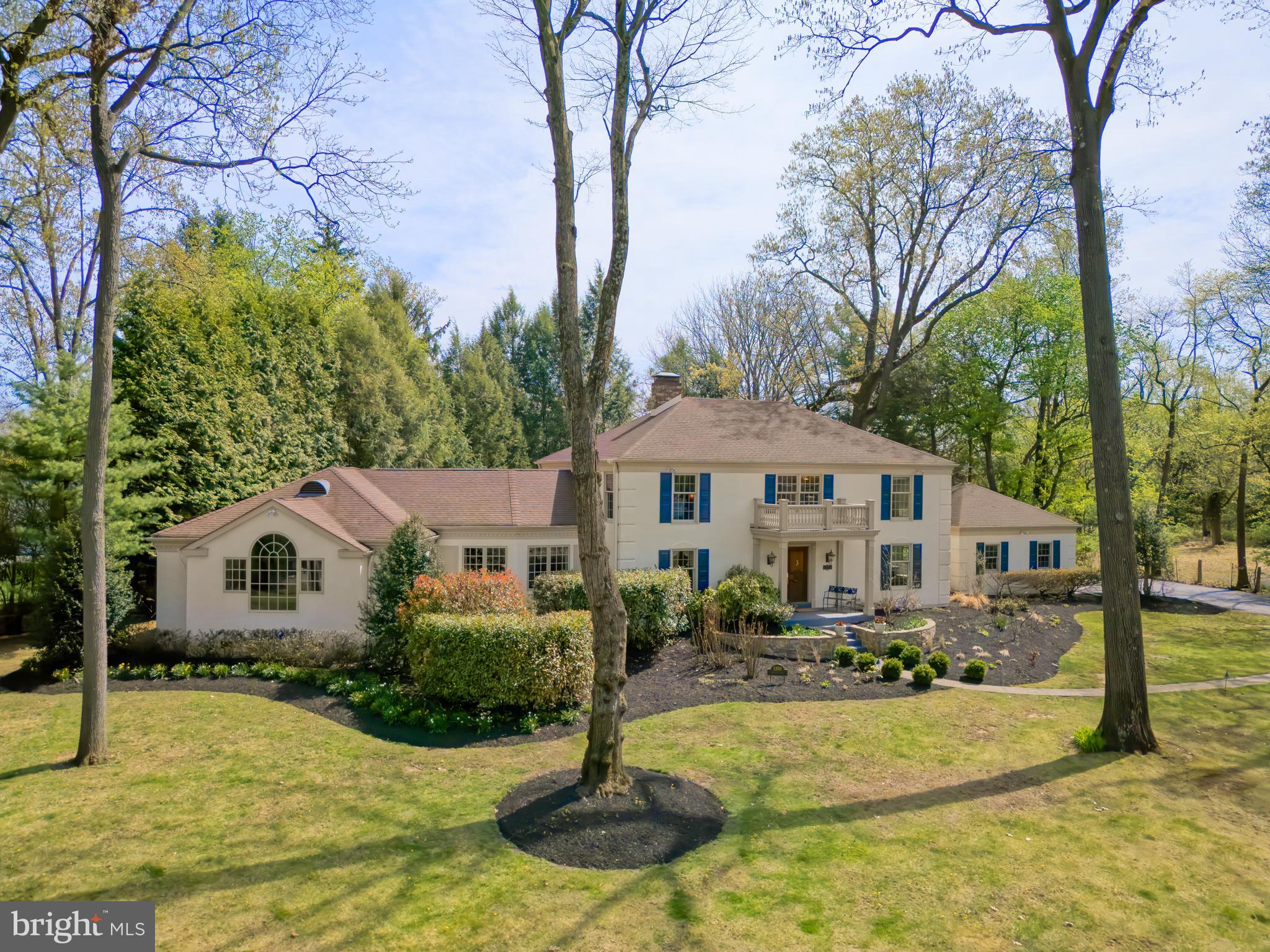 Welcome to 1398 Morstein Road, an expansive classic center hall colonial in the highly sought-after Charter Chase community. Set on a private, one-acre lot surrounded by mature trees and gardens, this spectacular home offers four large bedrooms and four bathrooms with meticulous attention to detail throughout all the rooms. The elegant foyer with a curved staircase sets the tone for the rest of this lovely home. The French-inspired cook’s kitchen features a travertine floor, new Taj Mahal quartzite countertops, newer appliances and French doors which open to the fully-fenced large backyard. The family room/library features custom cabinetry with lit bookcases, a coffered beamed ceiling and shares a double-sided gas fireplace with the adjacent living room. There is also a well-appointed bar room with a copper sink, custom cabinetry for glassware and storage, granite countertops, and a built-in wine/beer refrigerator. The bar room leads seamlessly to the grand family room which opens to a slate patio outside the French doors. It is the perfect set up for entertaining or simply enjoying your own very private retreat. Upstairs, two of the four bedrooms (including the large primary suite,) open onto an expansive deck overlooking the grounds. The other two bedrooms are front-facing and are filled with natural light. The primary suite is bright and airy, complete with a sitting area and an en-suite bath with an oversized glass-enclosed shower. Additional highlights in this well-maintained home include custom moldings throughout, hardwood floors, a finished basement plus plenty of additional storage, custom sound system, a new roof, two car garage and fresh interior paint—making this home truly move in ready. Charter Chase is a vibrant community offering a clubhouse, tennis courts, large outdoor pool and also a baby pool and a two-acre pond for fishing enthusiasts. This home offers an idyllic setting yet it is located with convenient access to local amenities and commuter routes, with parks, shopping, dining, and seamless access to Rte 202 all nearby. Request a personal tour today!