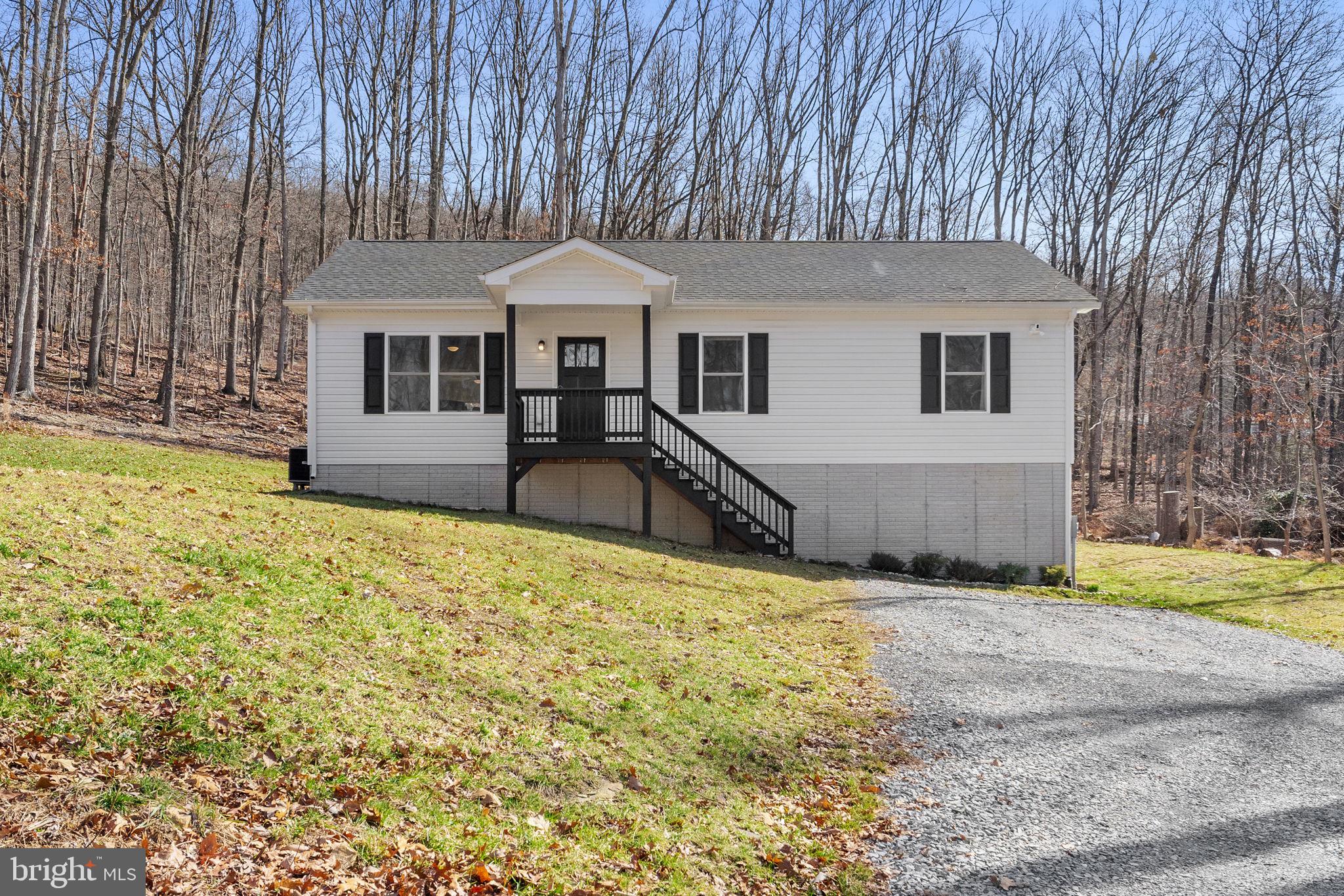 Welcome to 1442 Johnnycake Lane, Harpers Ferry, WV, where modern comfort, mountain living, and investment potential come together.

Built in 2020, this low-maintenance home offers the perfect opportunity for full-time living, a weekend retreat, or a turnkey short-term rental investment. Situated in the desirable Mountain Lake Club community, you'll enjoy the peace and privacy of nature while remaining close to all the recreation and attractions that make West Virginia's Eastern Panhandle so special.

The main level features convenient one-level living with 3 bedrooms and 2 full bathrooms, luxury vinyl plank flooring throughout the main living areas, and cozy carpeting in the bedrooms. The open layout creates an inviting atmosphere for everyday living and entertaining alike. Enjoy your morning coffee or family dinners at the kitchen table while taking in the sights of local wildlife right outside your windows, a daily reminder of the beauty that surrounds you.

Downstairs, the finished lower level offers incredible flexibility with a spacious second family room, recreation room, game room, home office, fitness area, or guest retreat. The possibilities are truly endless, allowing the space to adapt to your lifestyle needs.

As a resident or offer to your guests, you can enjoy access to Mountain Lake Club amenities, including a private lake, beach area, swimming, fishing, boating, playgrounds, tennis courts, and community events throughout the year.

Outdoor enthusiasts will appreciate being just minutes from hiking, biking, kayaking, tubing, fishing, and exploring the scenic Shenandoah and Potomac Rivers. Nearby Harpers Ferry National Historical Park, local wineries, breweries, restaurants, and charming small towns provide endless opportunities for adventure and relaxation.

Whether you're looking for a primary residence surrounded by nature, a mountain getaway, or an income-producing Airbnb property, 1442 Johnnycake Lane offers the flexibility, modern construction, and sought-after location to make your vision a reality.