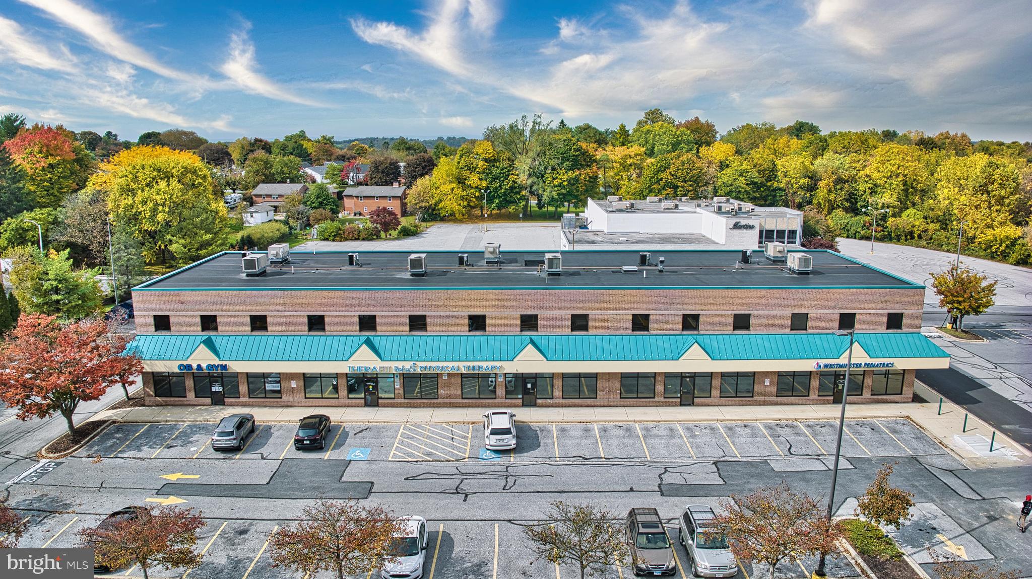 “The Marathon Building” Handicap first floor retail/office space.
Offering a retail/medical/office space at The 140 Village Shopping Center (AVAILABLE JANUARY 1, 2023). Suite 101, Class A Medical/Office, First Floor, 50+ parking spaces, buildout allowance for a longterm tenant. 
1,800 sq/ft currently divided into a large waiting area/receptionist station, kitchenette, 6 private office/exam rooms, 2 restrooms in the unit, large filing room/medical supply station in the back of the unit. Large printing/mail station behind the receptionist countertops. High ceilings throughout, professional fluorescent lighting, medical grade vinyl flooring in the exam rooms/offices, commercial carpet in common areas/hallways. 
$17.85/PSF NNN (Tenant pays monthly rent, property insurance, electric, CAM tenant’s responsibility). 
$2,677.50 monthly rent plus NNN expenses paid by Tenant. 
3 year minimum lease, 5 year minimum lease for major renovation/buildouts. 
Shown by appointment only as this space is still occupied by a medical practice.