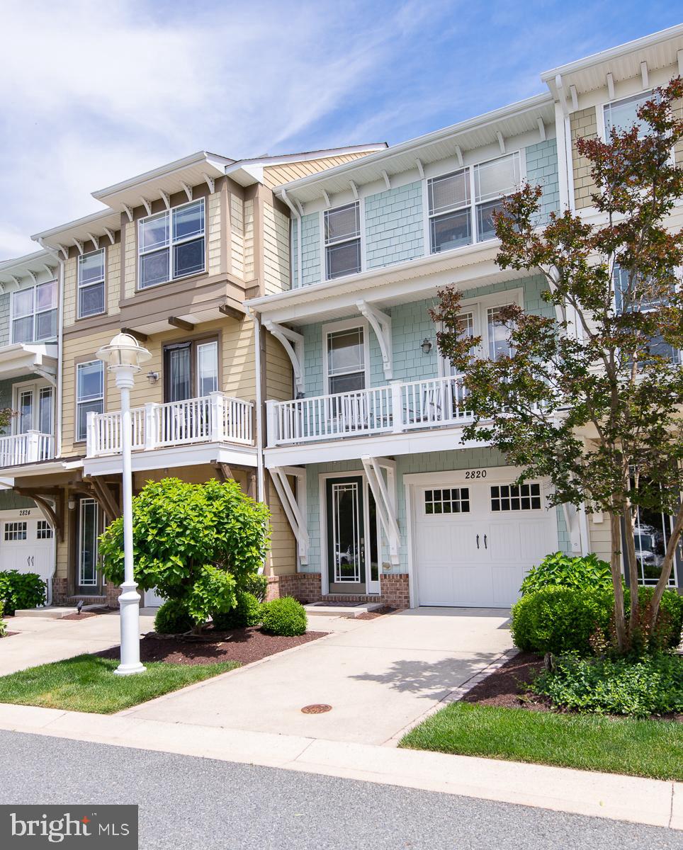 Experience resort-style living at an exceptional value in the Residences at River Marsh. Perfectly positioned between the Hyatt Chesapeake Bay Golf Resort, Spa & Marina and the award-winning River Marsh Golf Club, this beautifully maintained 4-bedroom, 3.5-bath townhome offers the ideal blend of waterfront recreation, golf course views, and luxury amenities on Maryland's Eastern Shore.

Located just a short stroll from the marina on the Choptank River, boaters will appreciate the opportunity for annual marina memberships with slips available to keep your boat in the water and ready for your next adventure. Golf enthusiasts will enjoy front-row views of the 2nd fairway and 3rd hole from multiple outdoor living spaces, including a ground-level patio, screened porch, and private balcony off the primary suite.

Inside, the thoughtfully designed three-level floorplan features hardwood flooring, a spacious center-island kitchen with stainless steel appliances, breakfast bar seating, dining area, and an inviting living room ideal for entertaining family and friends. A front porch overlooking the Hyatt grounds offers glimpses of the marina and resort atmosphere that makes River Marsh one of the Eastern Shore's premier destinations.

The upper-level primary suite serves as a private retreat with balcony access, customized California Closets, and an upgraded spa-inspired shower featuring body sprays, handheld wand, and traditional  shower head. Additional custom California Closets throughout the upper-level bedrooms and pantry provide exceptional organization, while updated lighting fixtures add a fresh, sophisticated touch throughout the home.

The attached one-car garage provides ample storage for golf clubs, bicycles, boating equipment, beach gear, and everything needed to enjoy the River Marsh lifestyle. Optional memberships are available for golf, community amenities, and select Hyatt resort privileges, allowing owners to tailor their experience to their interests.

Enjoy the convenience of walking to the marina, Blue Point Provision Company, golf course, resort amenities, and scenic waterfront trails. Whether you're seeking a full-time residence, weekend getaway, or vacation property, this is an outstanding opportunity to own in one of Cambridge's most desirable resort communities. Best of all, it is currently the best-priced townhome opportunity in River Marsh.