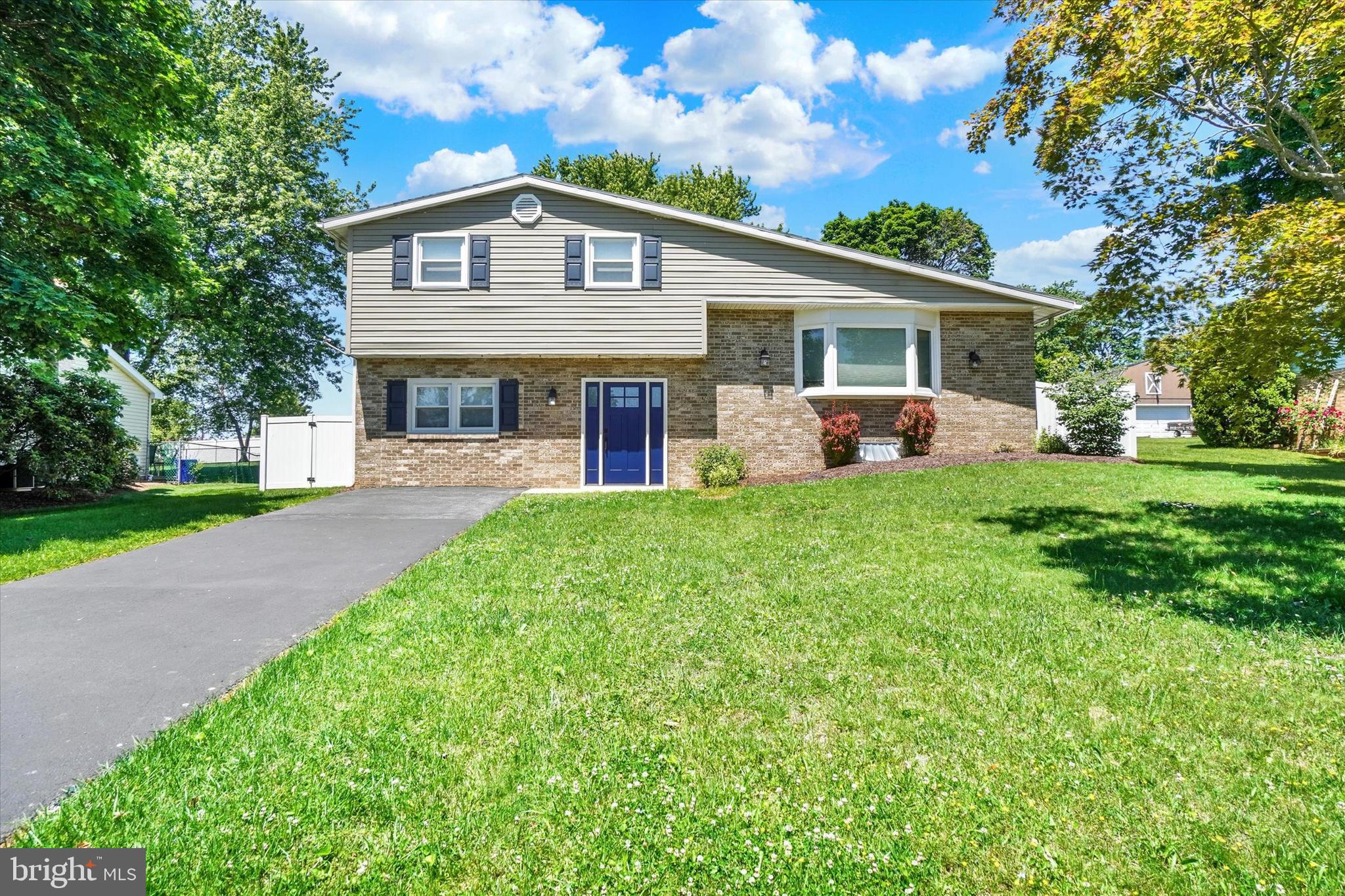 Welcome home to this well-maintained 3-bedroom, 2-bath split-level home nestled on a quiet street in the  desirable Dallastown school district. Thoughtfully updated throughout, this inviting property features beautiful newer flooring, updated windows, and a renovated kitchen complete with newer appliances, offering both style and functionality.

Major mechanical updates provide peace of mind, including a newer A/C unit and water heater. The versatile split-level layout offers comfortable living spaces perfect for everyday living and entertaining.

Step outside to enjoy the fully fenced backyard, ideal for pets, play, gardening, or outdoor gatherings. A large storage shed provides ample space for tools, equipment, and seasonal items.

Conveniently located near schools, shopping, dining, and local amenities, this move-in-ready home combines comfort, updates, and a fantastic location. Don't miss the opportunity to make it yours!