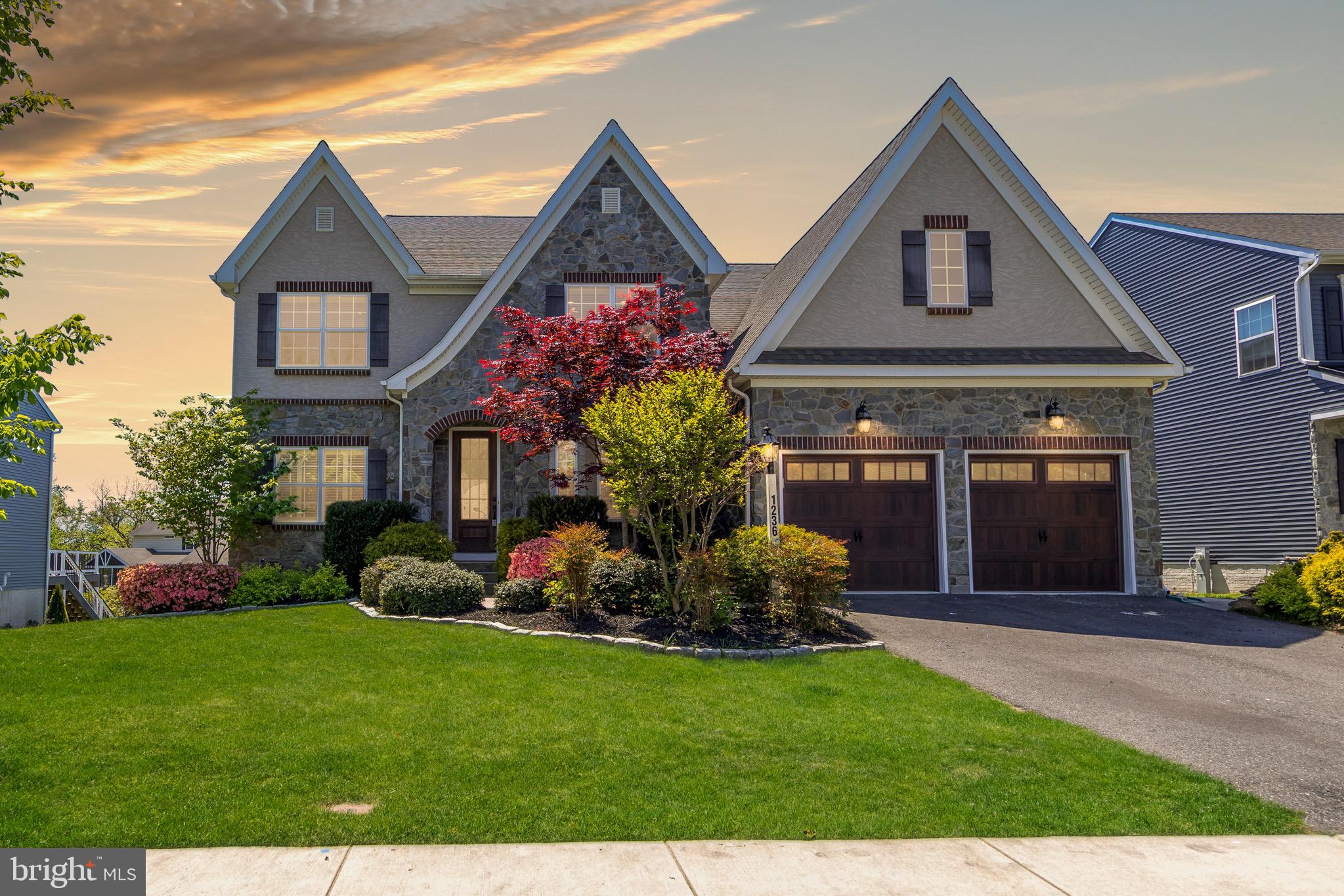 Highly motivated seller!   Come see all that this home has to offer.   This stunning Keystone-built home combines luxury finishes, thoughtful design, and incredible living space throughout. Enjoy the exact high-end upgrades of the community's model home, plus two major bonuses: even more square footage and a fifth above-grade bedroom with a private ensuite bath.
This home features an open floor plan with wide-plank engineered flooring throughout. The kitchen is a standout, anchored by a massive island that overlooks the living area.  It is complemented by quartz countertops and stainless steel appliances.
For ultimate convenience, the primary suite is located on the main level. This private retreat includes a spa-inspired bathroom with a walk-in shower and two spacious walk-in closets.
On the upper level, you’ll find four additional bedrooms and a versatile loft, perfect for a secondary lounge or study space.  Every bedroom in the house is equipped with custom California Closets.
The living space extends outdoors to a covered porch featuring a two-sided gas fireplace, creating a cozy atmosphere for any season. The walk-out lower level is fully prepared for hosting, complete with a wet bar, a massive recreation room,  and direct access to the patio and backyard.
This home offers the perfect balance of high-end features and a functional layout for modern living.