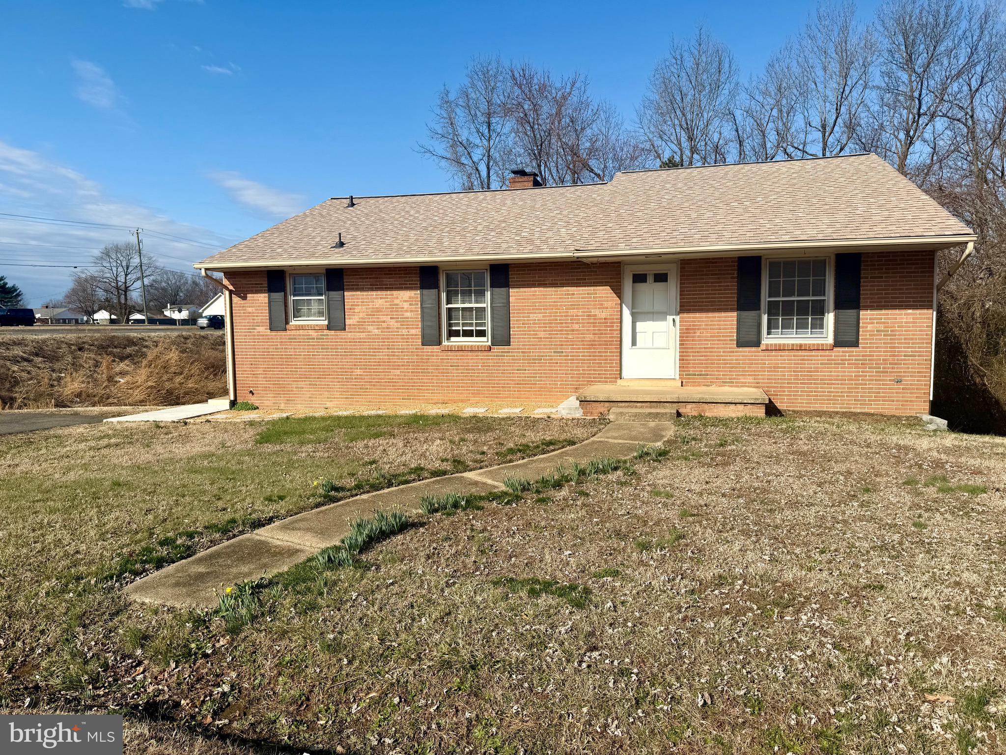 Charming brick rambler, centrally located directly off Plank Rd. Home is minutes from commuter lots, 95, shopping, restaurants & so much more! Features 3 spacious bedrooms, separate living and dining room all with newly polished hardwood floors. Central AC and Heat. Multiple separate entrances into the home, including a front entrance, kitchen entrance and 2 lower- level basement entries. Spacious sized yard. Home has been professionally cleaned and is ready for a new tenant! Washer and dryer are not offered, however there are the appropriate hook ups for tenants to provide their own. *Property is also being listed for commercial lease*