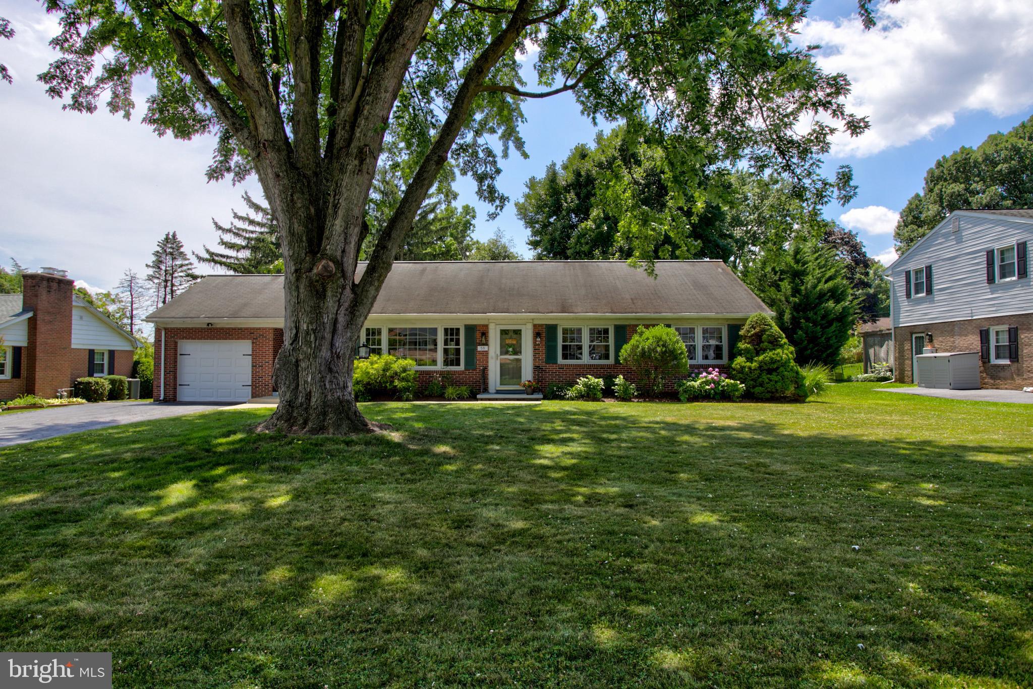 Welcome to this beautiful brick rancher in Conestoga Valley School District loaded with charm and ready for a new owner!  As you enter the home, you'll find a bright, cheery living room with gas fireplace for cozy winter evenings.  The fantastic refinished hardwood floors run throughout the home and lead you into the open dining room/ kitchen. The kitchen was remodeled in 2018 and is complete with ceramic tile floor, stainless steel appliances, subway tile, butcher block counter tops, breakfast bar and chalkboard wall to stay organized. From the kitchen and dining room, you have a view of your large back yard. Down the hall  on the main floor, are 3 bedrooms and a remodeled bathroom (2018) with lovely ceramic tile flooring. The lower level has a cozy family room as well as another room with a large closet that could be a bedroom/guest room, office or hobby room.  Also in the basement is the laundry room and Bilco door access to the outside  and a separate storage/utility room.  From the kitchen, you can take your dinner or morning coffee outside and enjoy the patio and spacious backyard.  For the dog owners, this property comes with an invisible fence and plenty of room to explore.  Located in the Forest Hills neighborhood, you'll find a lovely place to walk or ride your bike while groceries, gas and restaurants are just minutes away.  A new HVAC system was installed in 2018. Don't miss your chance to own this home!