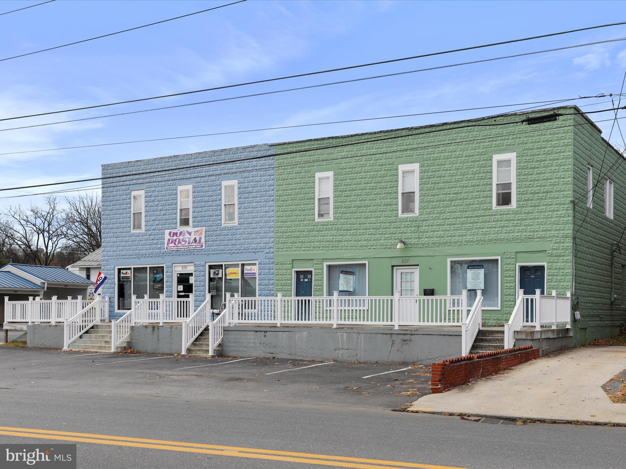 FULLY LEASED!  Great commercial/residential mixed use opportunity in the outskirts of Martinsburg.  Current lease in place for 1700 sq ft on main level to Goin' Postal until September of 2027.  1750 sq ft space to Right is Leased through 2030 at 1500 per month.  One apartment upstairs (839 1/2 Winchester) is leased at 1200 per month for 1 year through August 2026. Other two apartments leased upstairs with separate accesses  are month to month.  Rents have room to increase, but tenants are all long term and all tenants pay on or before first of the month.  Building is in great shape.  Overall Cap Rate is close to 9% with parking and easy access from Route 9 and downtown.  Property is in prime Martinsburg location.