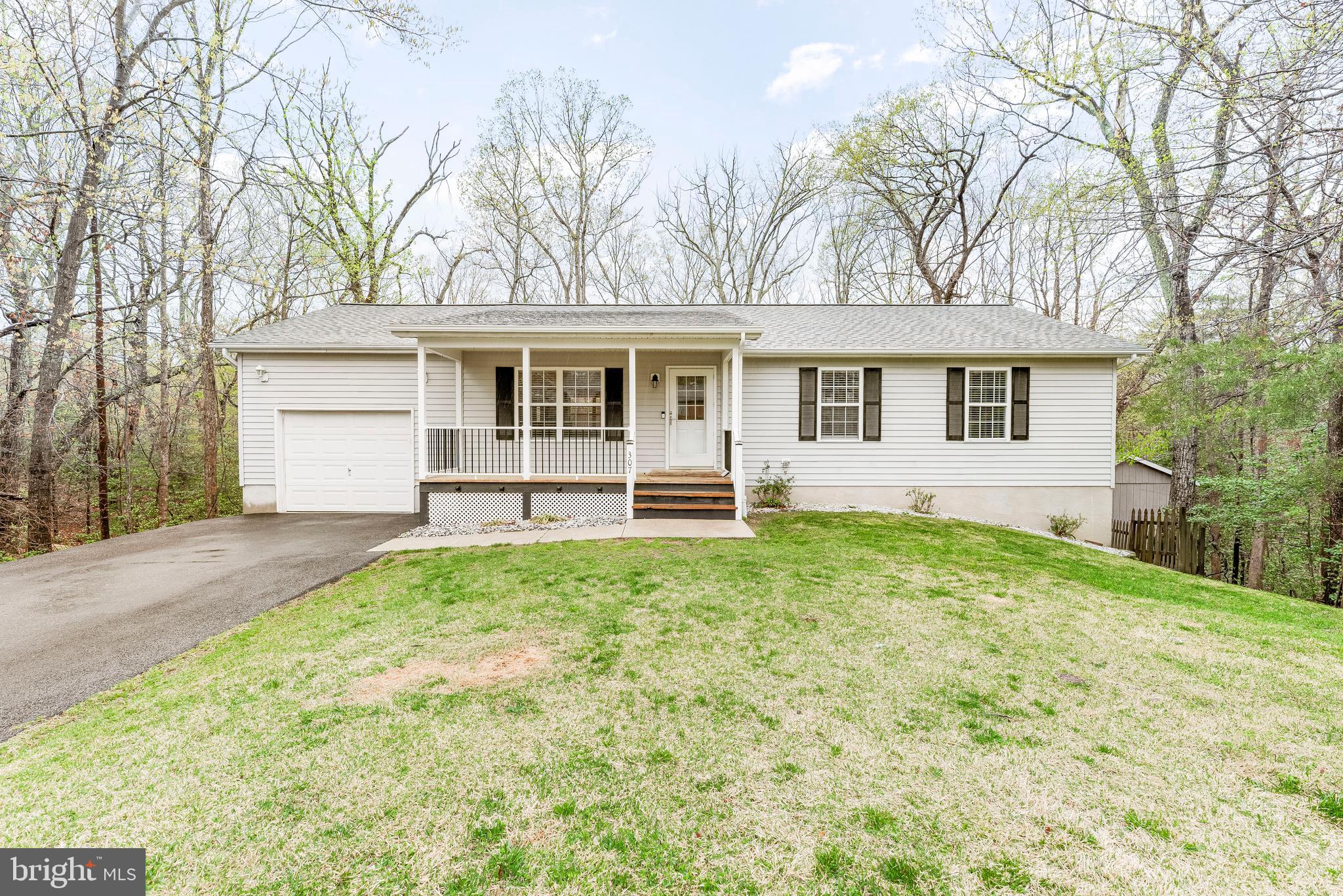 Stunning 4-Bedroom 2.5 Bathroom Home on 1 Acre in Lusby!

Welcome to your dream home! This beautifully updated 4-bedroom, 2.5-bath residence w/ a BRAND NEW ROOF and 1-year-old HVAC is nestled on a serene 1-acre lot in Lusby, offering the perfect blend of comfort, style, and functionality.

Step inside to a bright and open living area featuring soaring vaulted ceilings, recessed lighting, and durable luxury vinyl plank flooring throughout. The heart of the home is the gorgeous kitchen, showcasing ample cabinetry, gleaming granite countertops, stainless steel appliances, and a picture-perfect window with views of the wooded backyard.

Adjacent to the kitchen, the dining area offers a relaxed atmosphere ideal for everyday meals or entertaining. Just beyond, you’ll discover the standout feature of the home—a bonus room that flows seamlessly onto a spacious deck, the perfect setting for sipping your favorite beverage while taking in the sights and sounds of nature.

Down the hallway, you’ll find three comfortable bedrooms supported by a beautifully updated hall bath with an open-concept shower. The spacious primary suite offers a peaceful retreat, complete with a private ensuite bath.

The fully finished lower level provides even more living space with a large recreation room, an ideal home office or gym, a fourth bedroom, laundry area, and an additional sitting area or family room—perfect for movie nights or guests.

This property truly has it all—modern updates, thoughtful design, and a peaceful setting. Don’t miss your opportunity to call this stunning home yours. Schedule your private tour today!