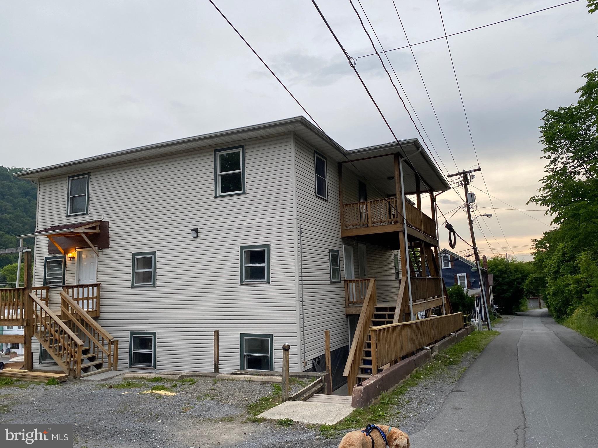 1 bedroom, 1 bath rental apartment on the upper level.  Close to downtown and easy access.  No smoking and no pets. One parking spot in the lot and then off street parking for additional.  Water, sewer, and trash are included.
