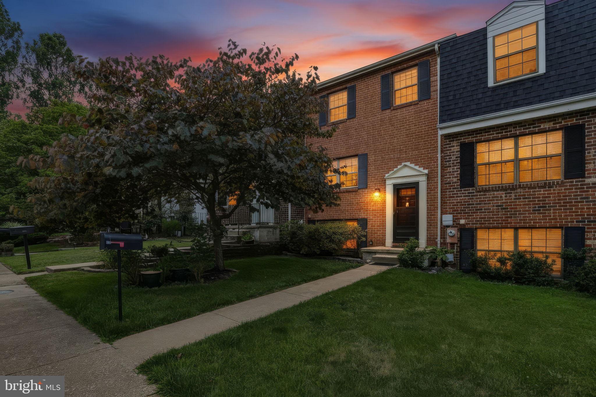 Welcome to this spacious  3 bed/2.5 bath brick townhome in the Drexel Woods community of Catonsville!  The main level, including updated kitchen, dining and living area, boasts gleaming hardwood floors and plenty of natural light.  The sliding glass door off the kitchen leads to a low maintenance deck for grilling or drinking your morning coffee.  Upstairs you will find 3 generously sized bedrooms with continued hardwood flooring and 2 full baths.  The lower level is finished with an additional living area and half bath.  Accessibility to the back yard can be found through sliding glass doors, making indoor/outdoor entertaining seamless.  This home is close to commuter routes and shopping, promising convenience for your daily routine.  Some photos are virtually staged.
